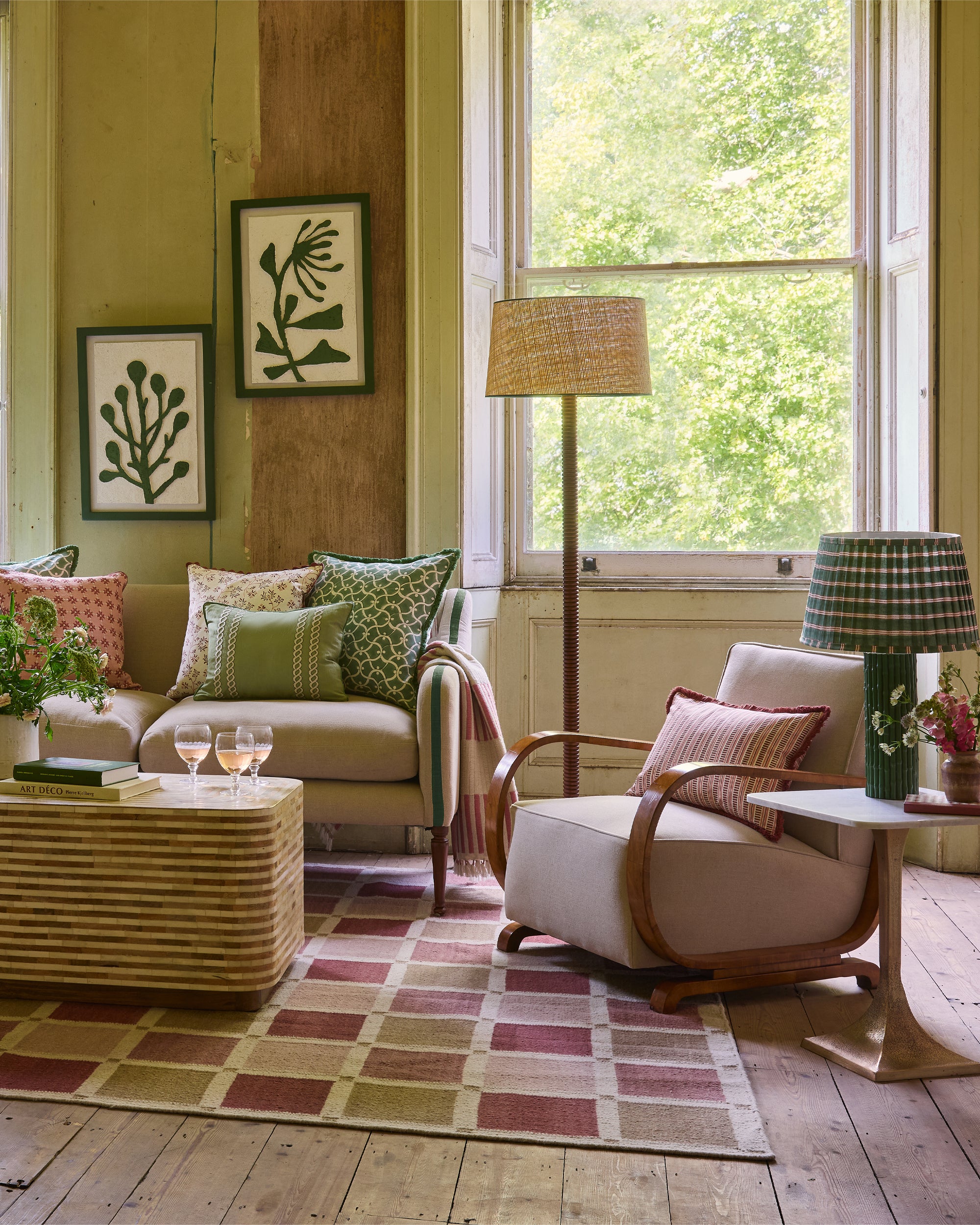 Cozy living room with a sofa, armchair, and coffee table in a home setting.