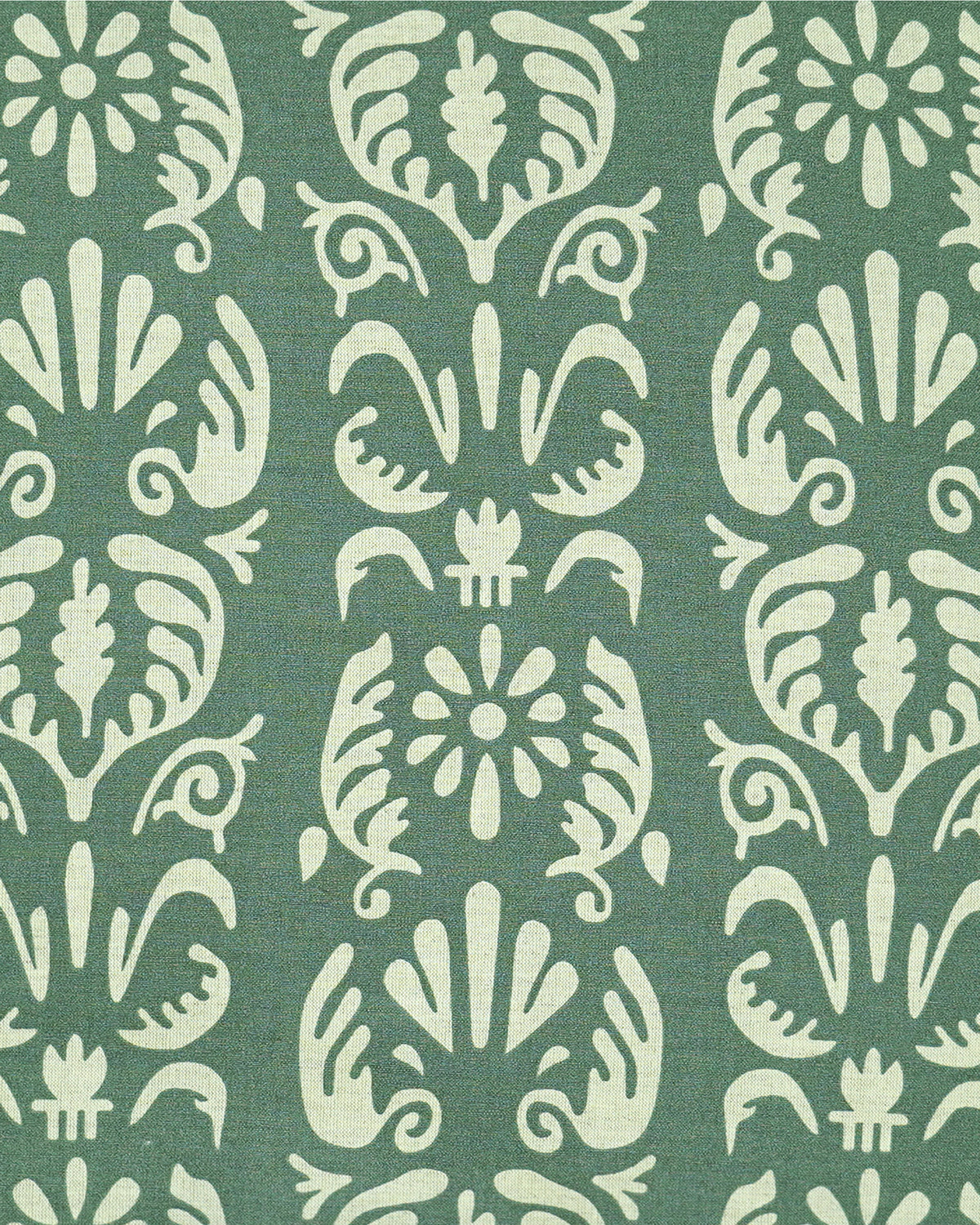 A close-up of a cushion featuring a repeating vertical damask-style design in sage green and cream.