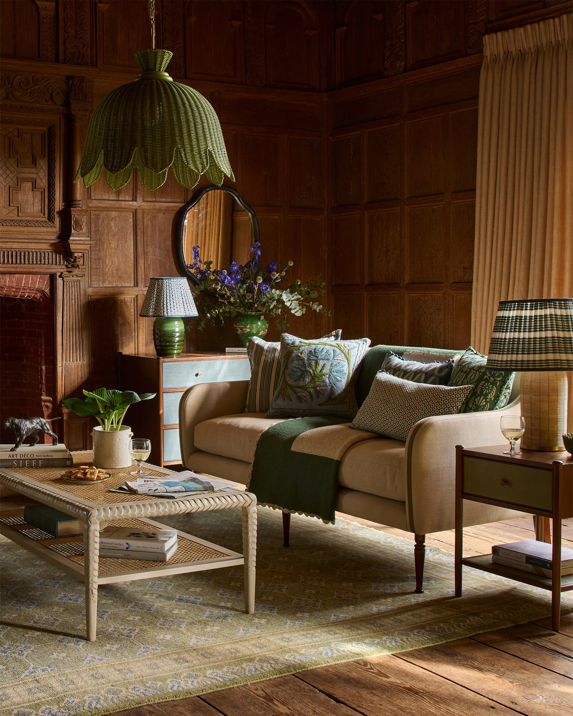 Cozy living room with a beige sofa, wooden coffee table, and decorative elements.