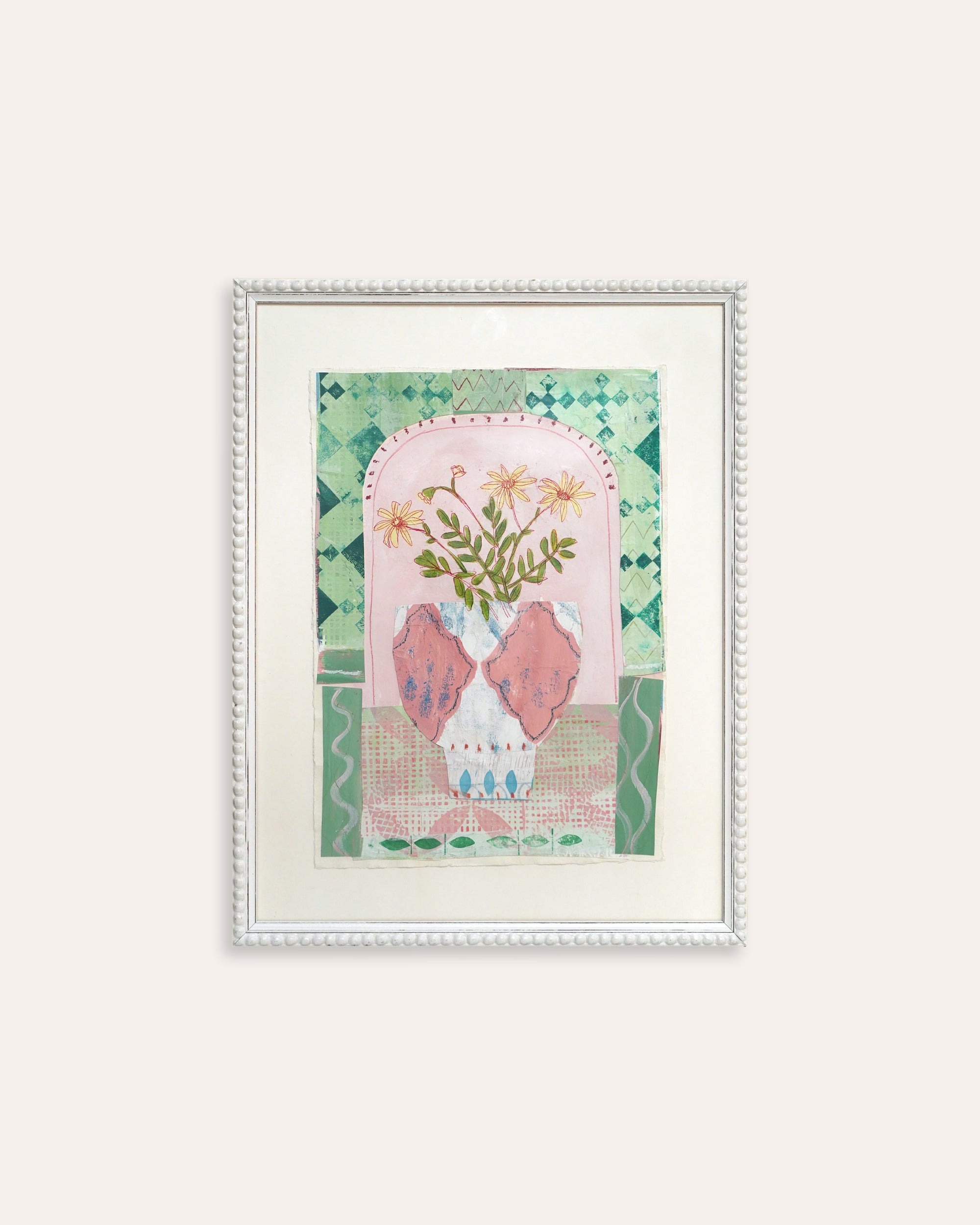Framed artwork with floral design on a white background