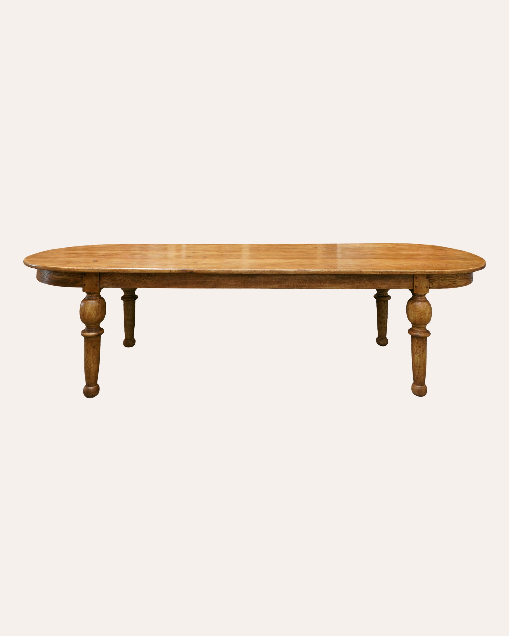 Wooden dining table on a white background