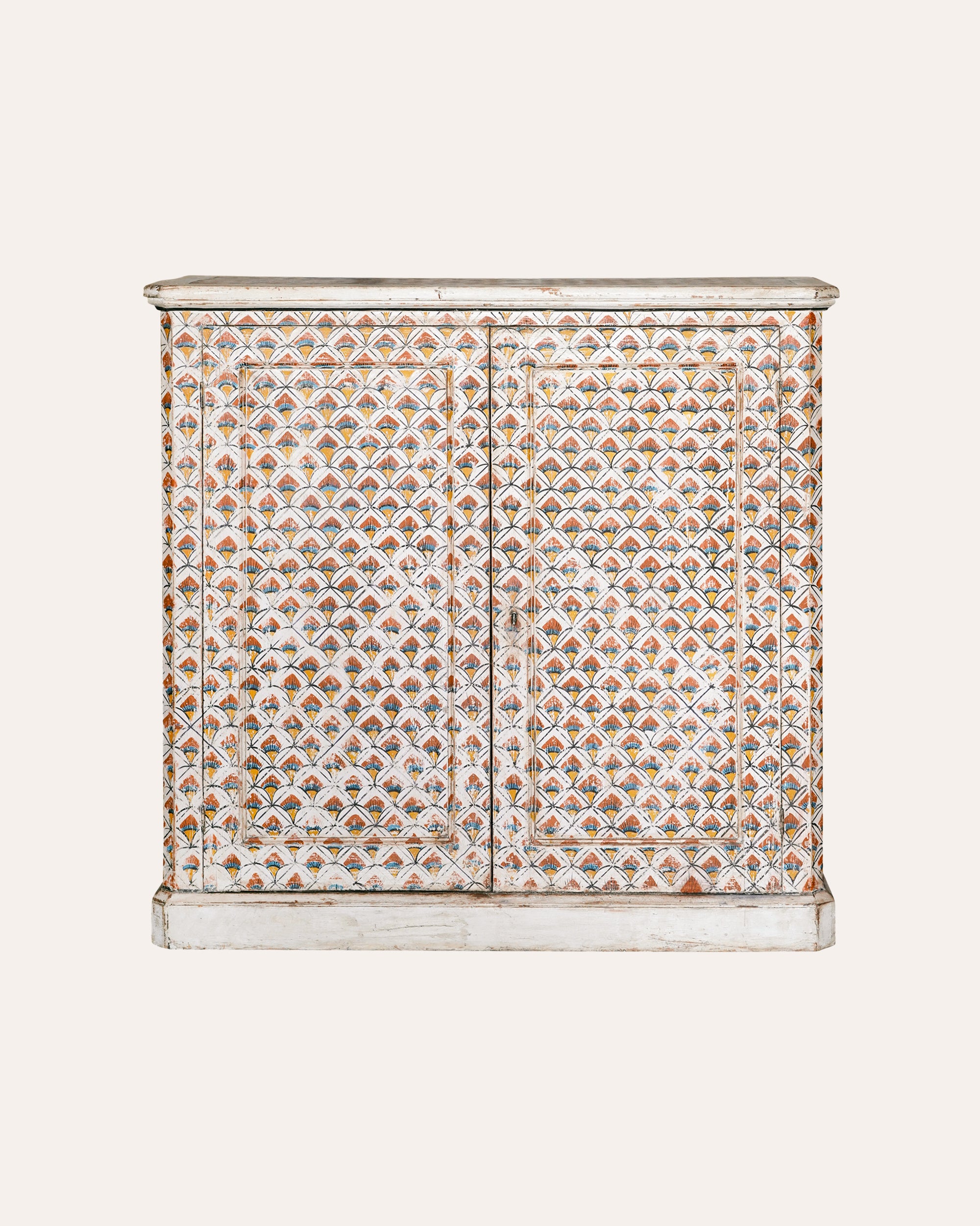 Decorative cabinet with a geometric pattern on a white background