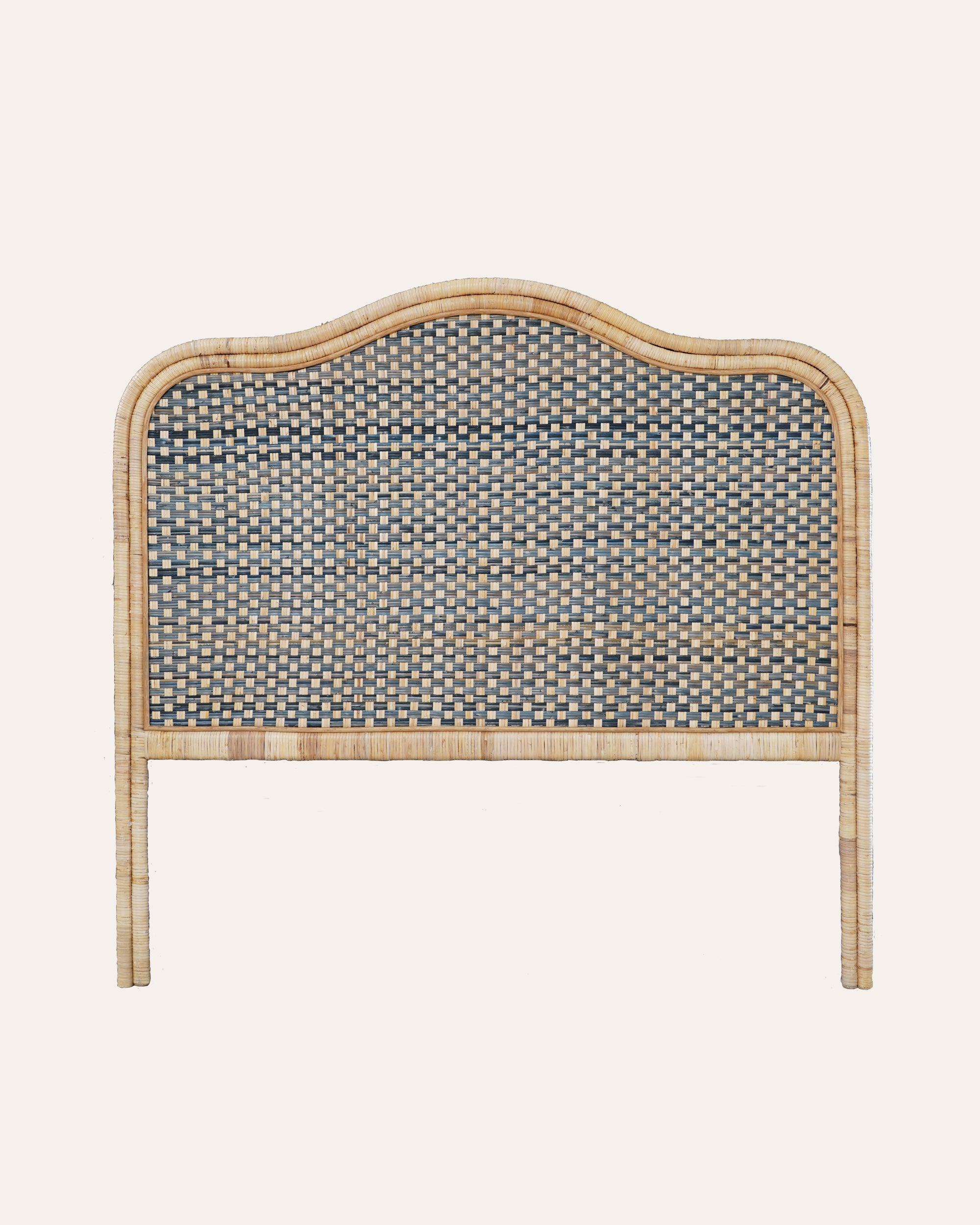 A king-sized rattan headboard with a blue checkered pattern and a curved shape at the top.