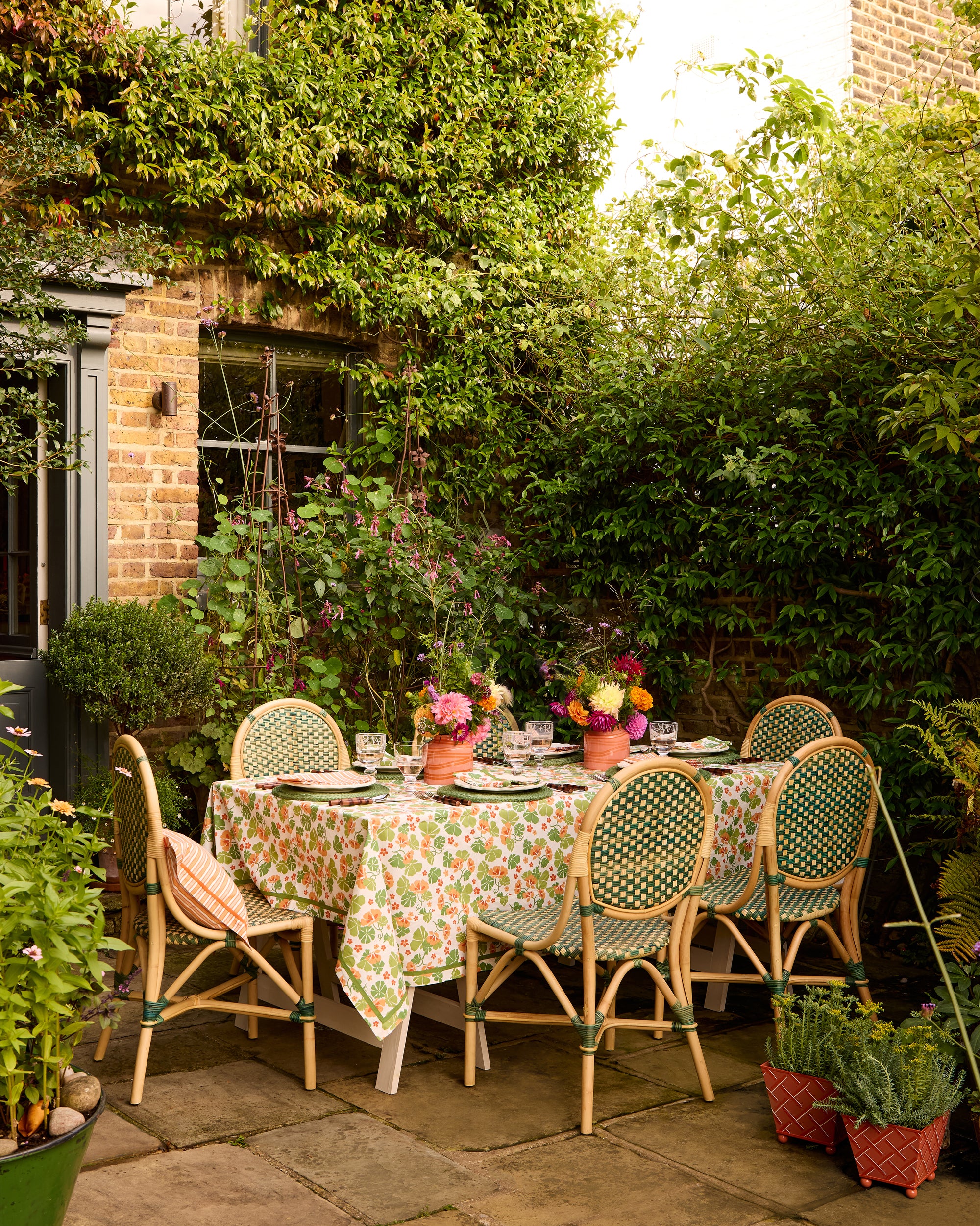 Beautiful outdoor dining tablescape featuring products from the Nasturtium collection