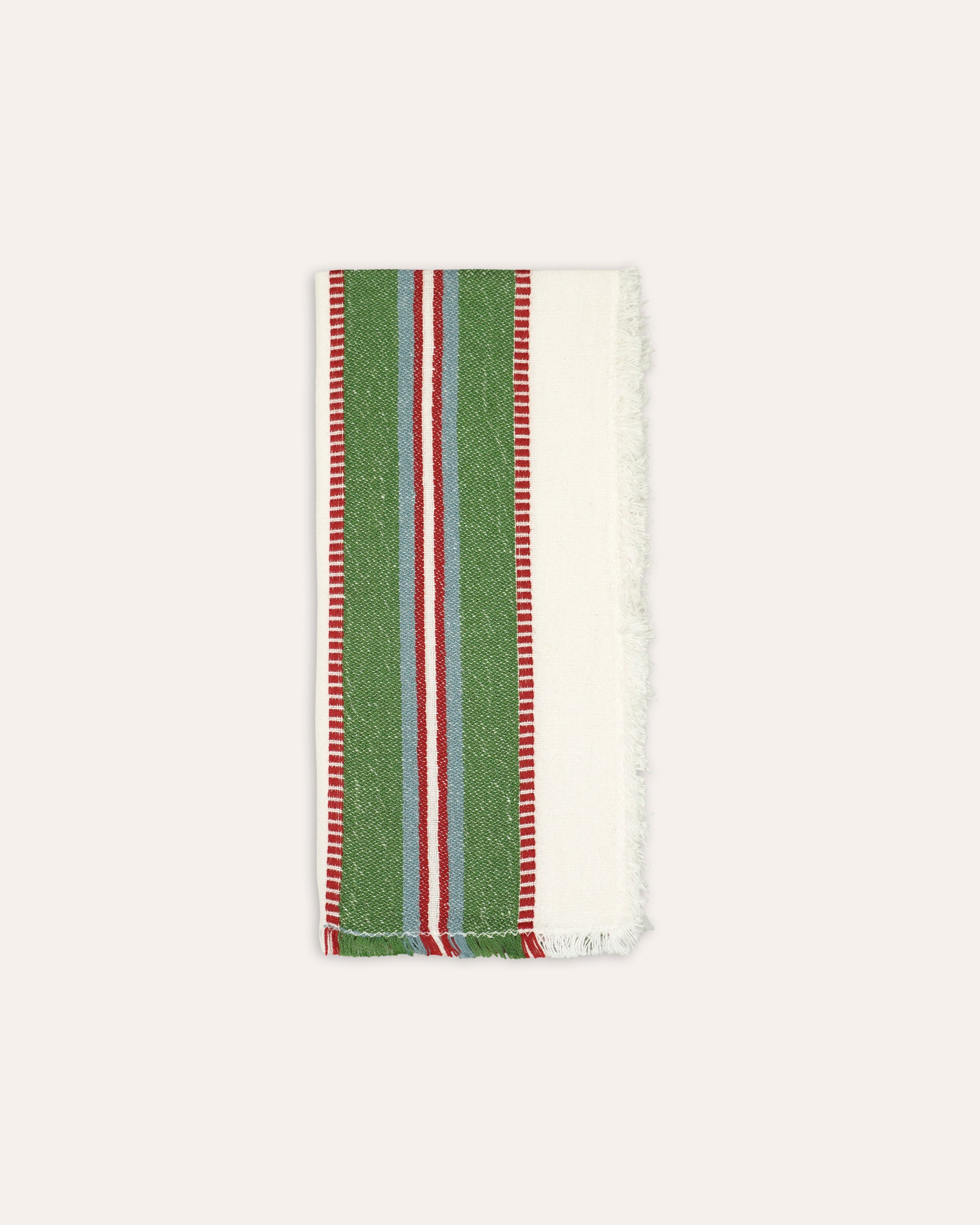 Striped napkin with green, red, and white pattern on a white background