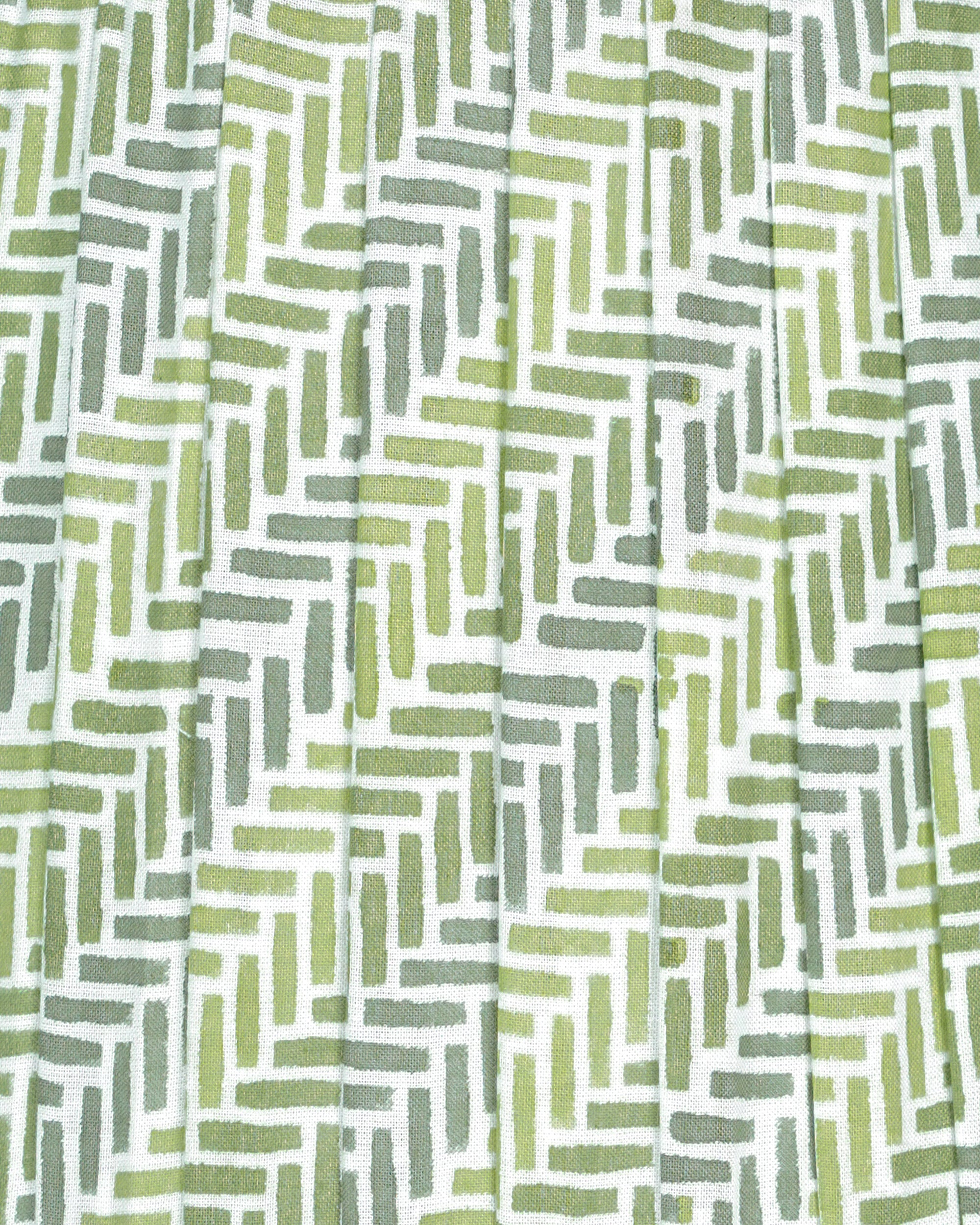 Close up detail image of the block printed green chevron lampshade