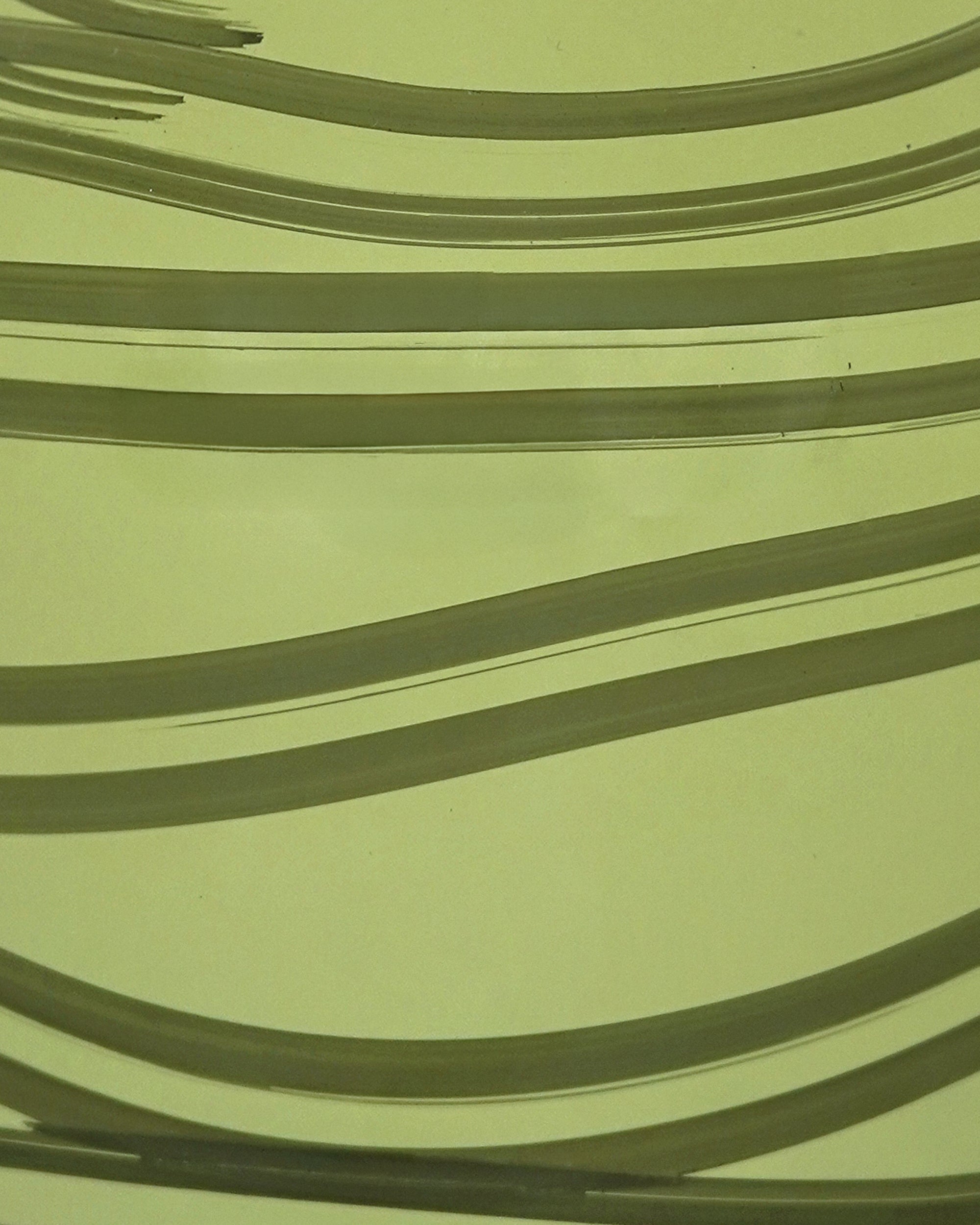 Close up detail image of the green Maypole glass vase