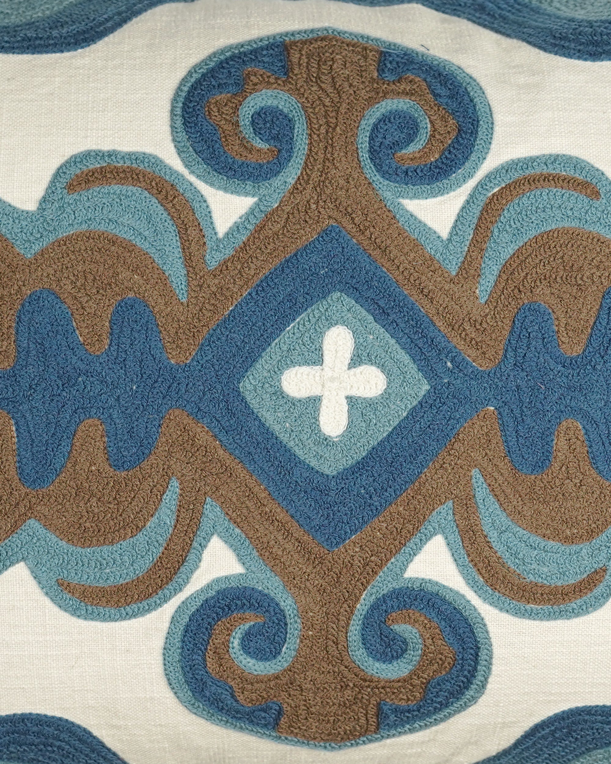 Close up detail of the scrolling crewel work cushion