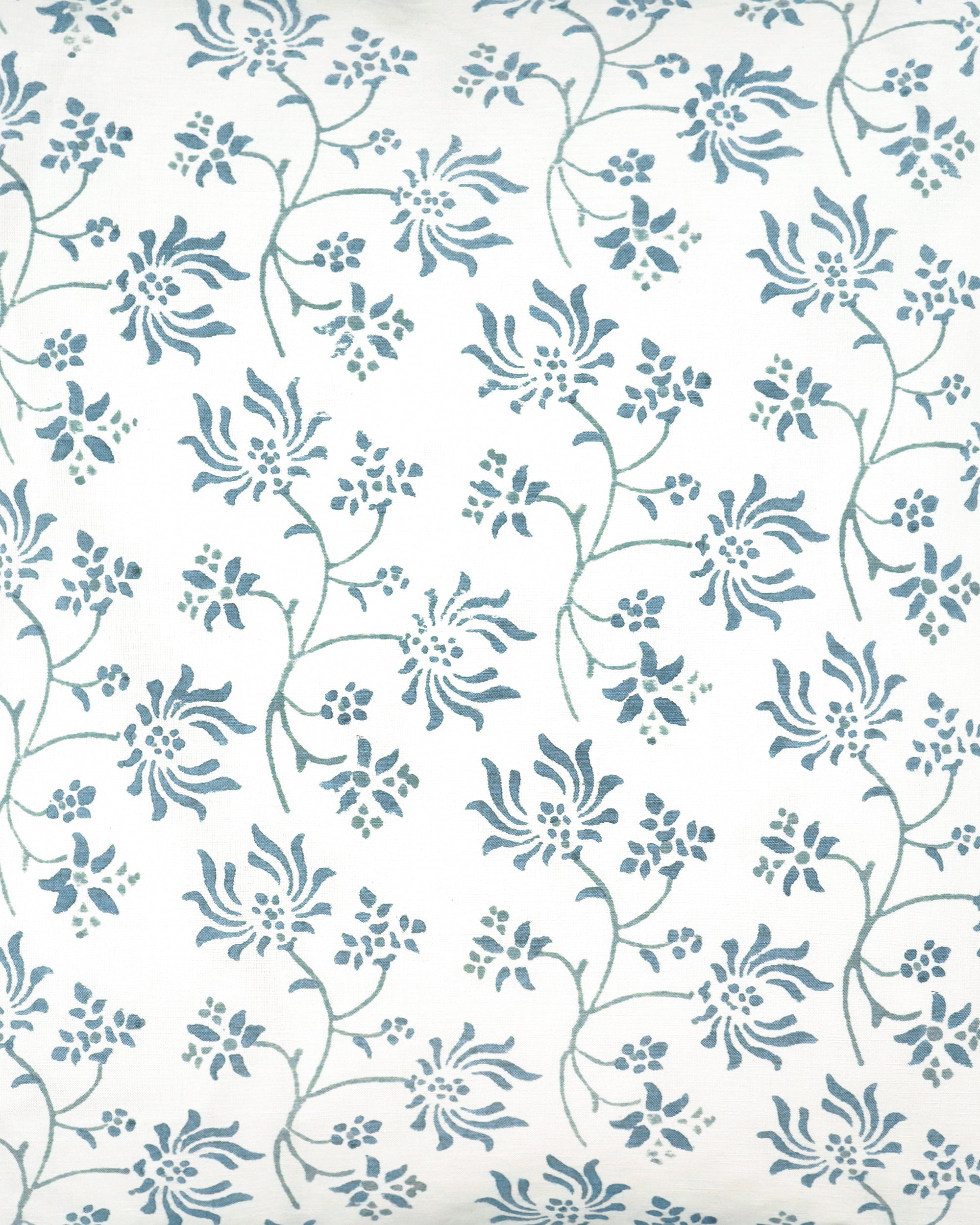 Close up detail of the blue Khiva square block print cushion with a blue floral pattern