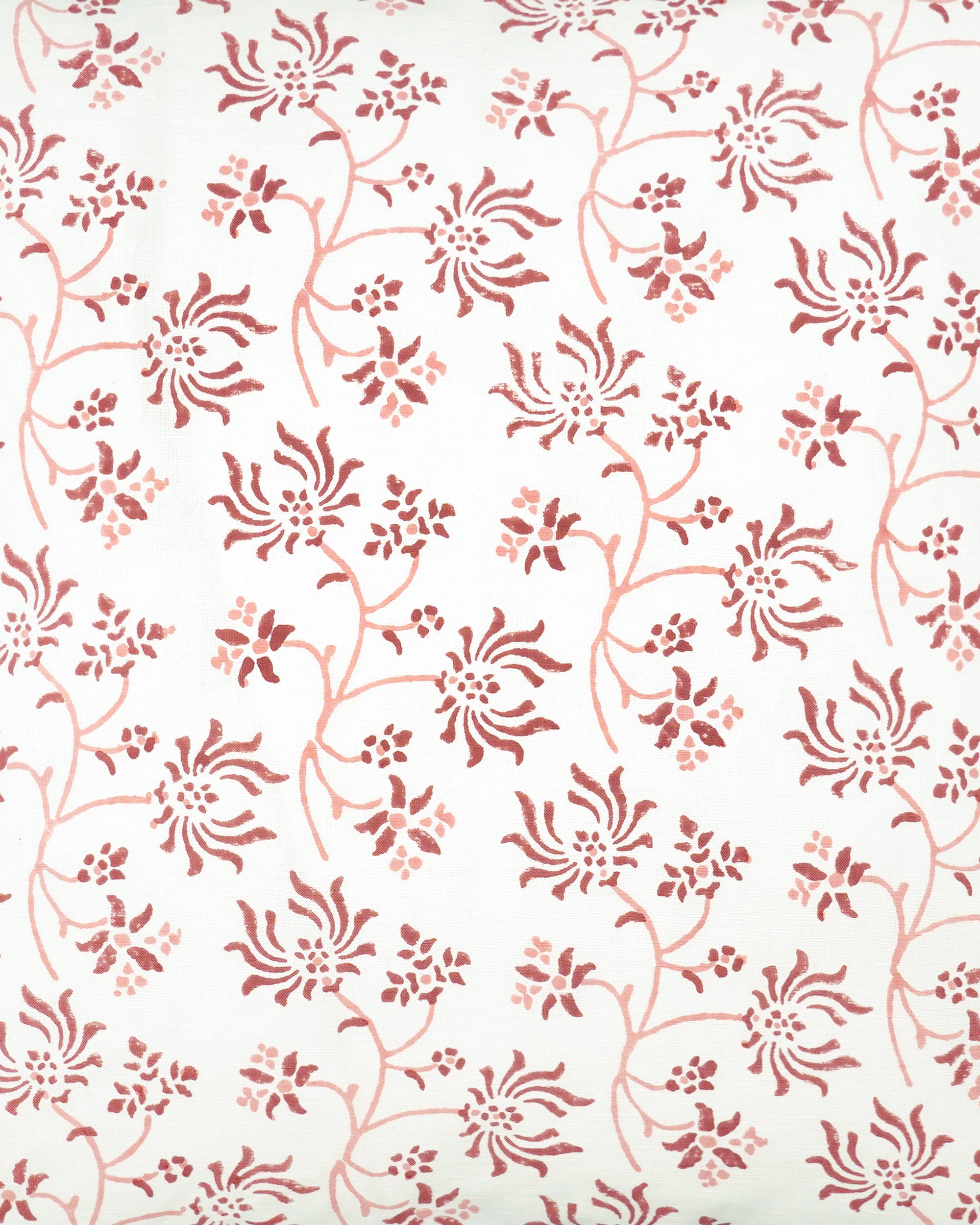 Close up detail of the pink block printed Khiva square floral cushion