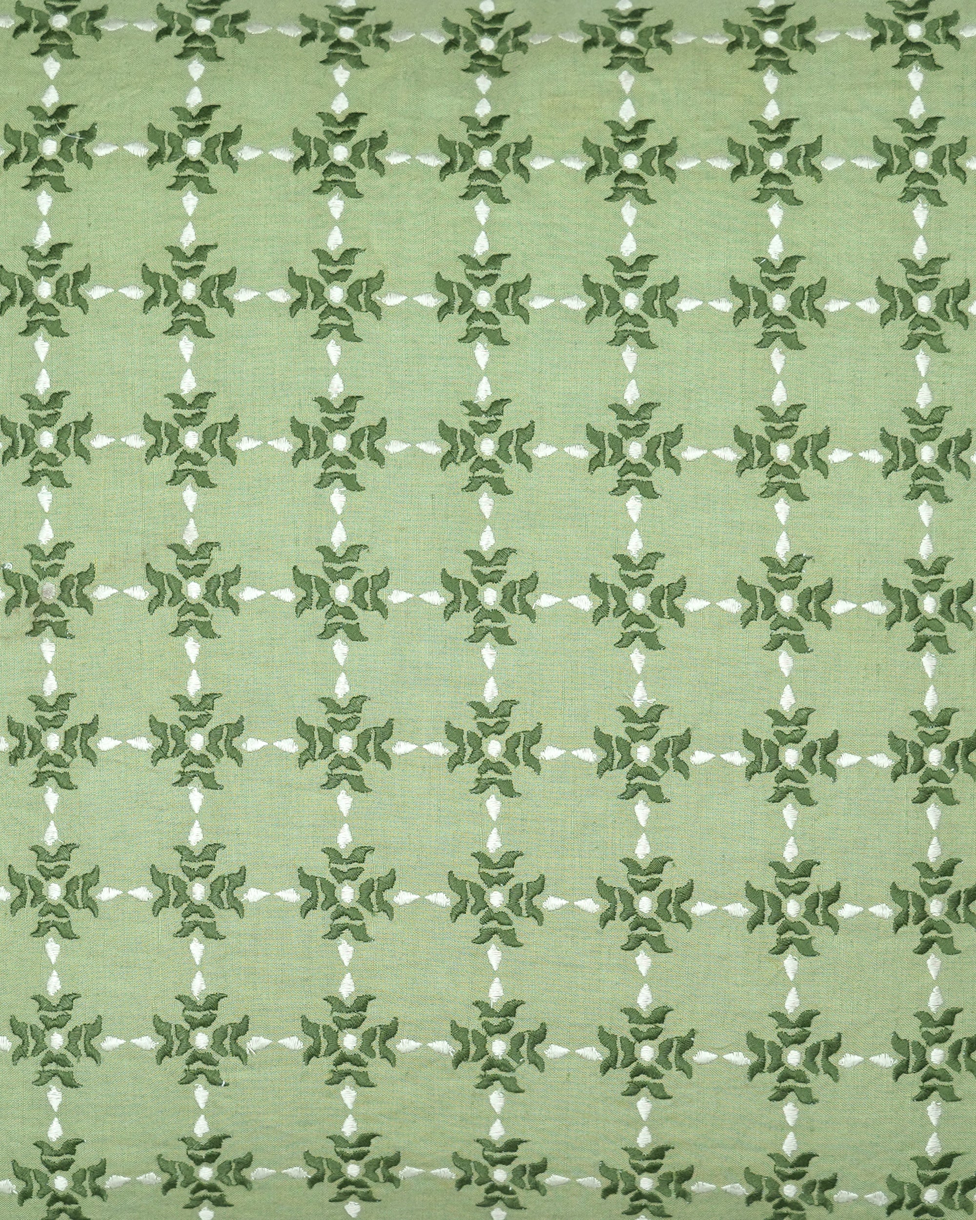 Close up detail of the green Khiva embroidered square cushion