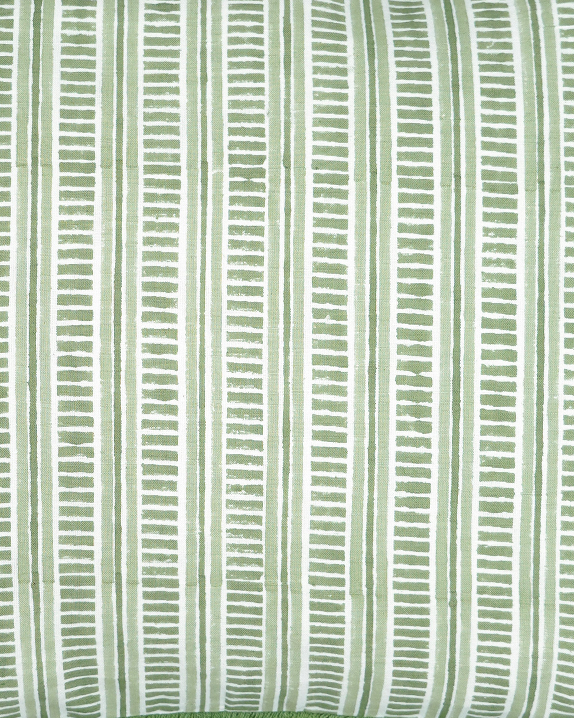 Close up of the green Patti block printed striped cushion