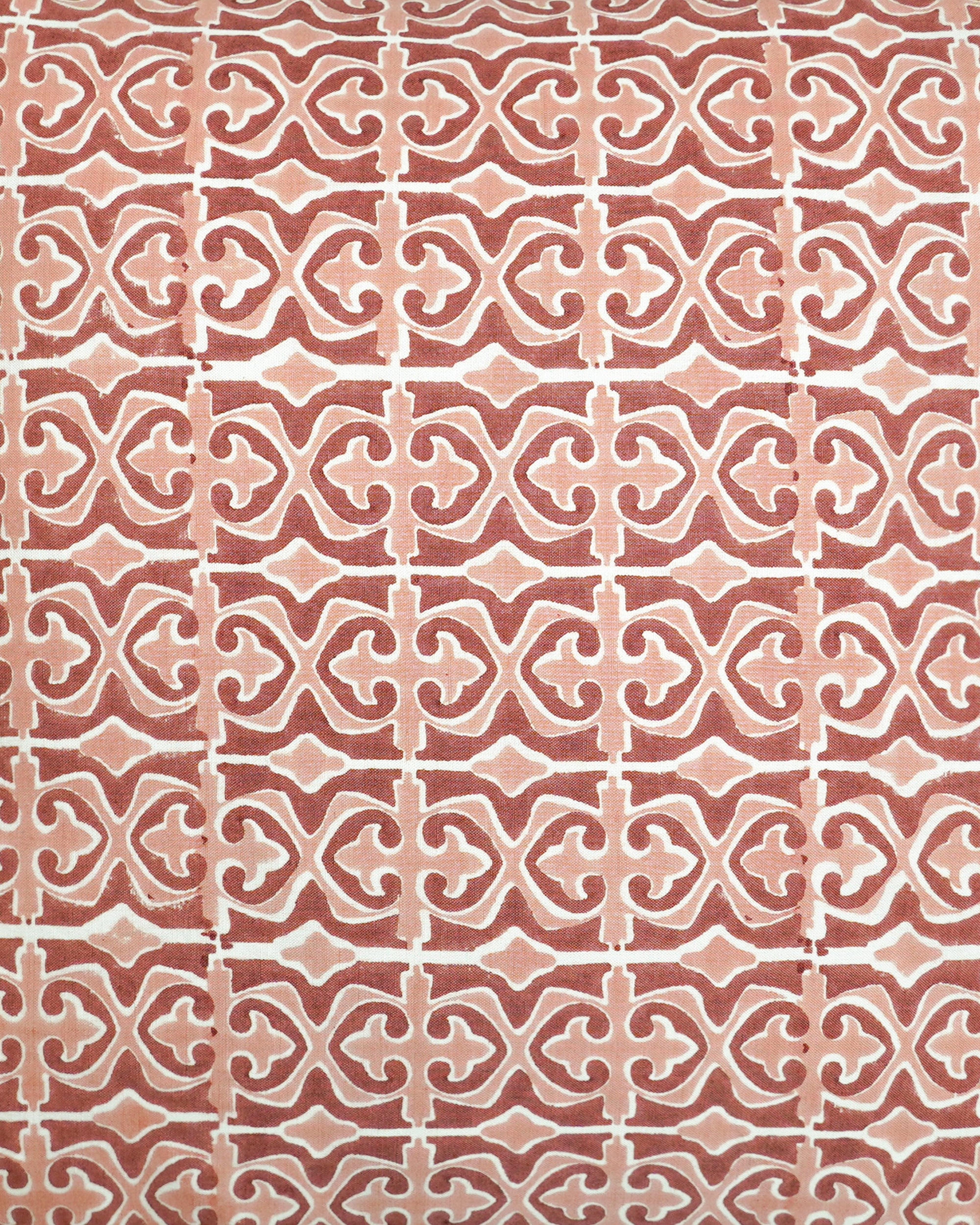 Close up detail image of the red geometric patterned Santa Clara square cushion