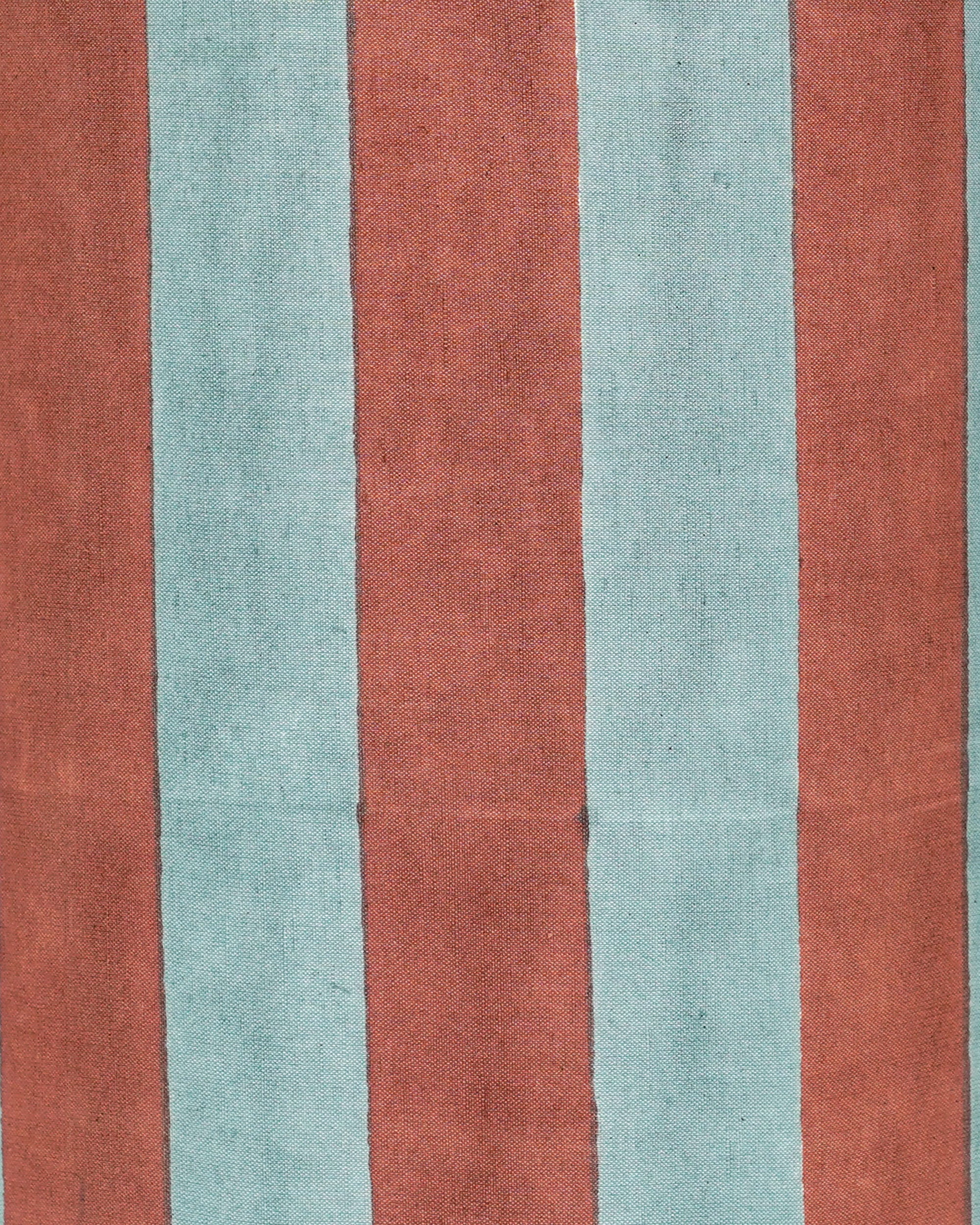 Close up detail image of the blue and red striped Drum lampshade