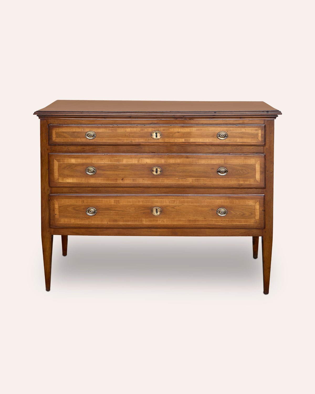 Early 19th Italian walnut inlaid three drawer commode, c1830