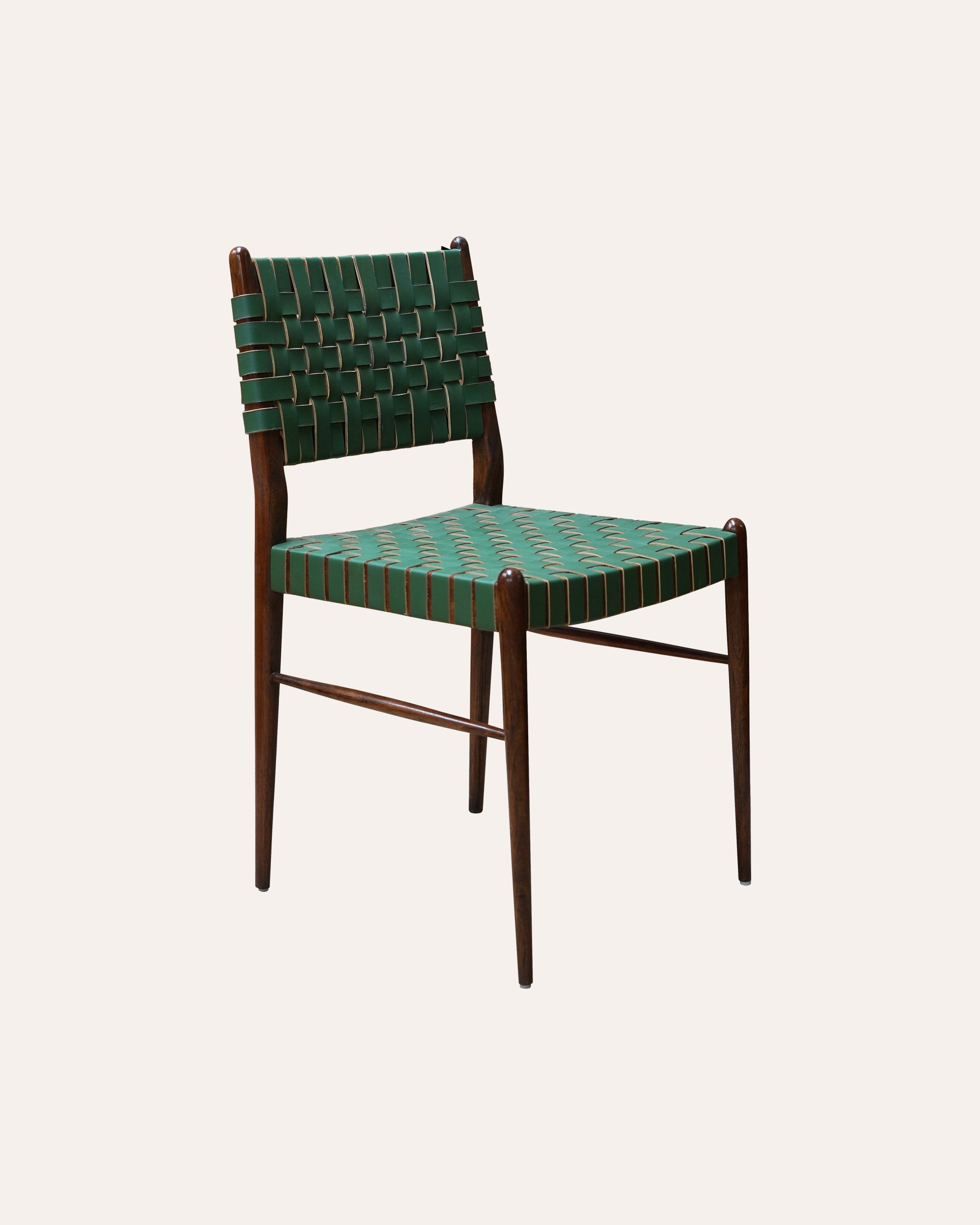 Chair with green woven seat and backrest on a white background
