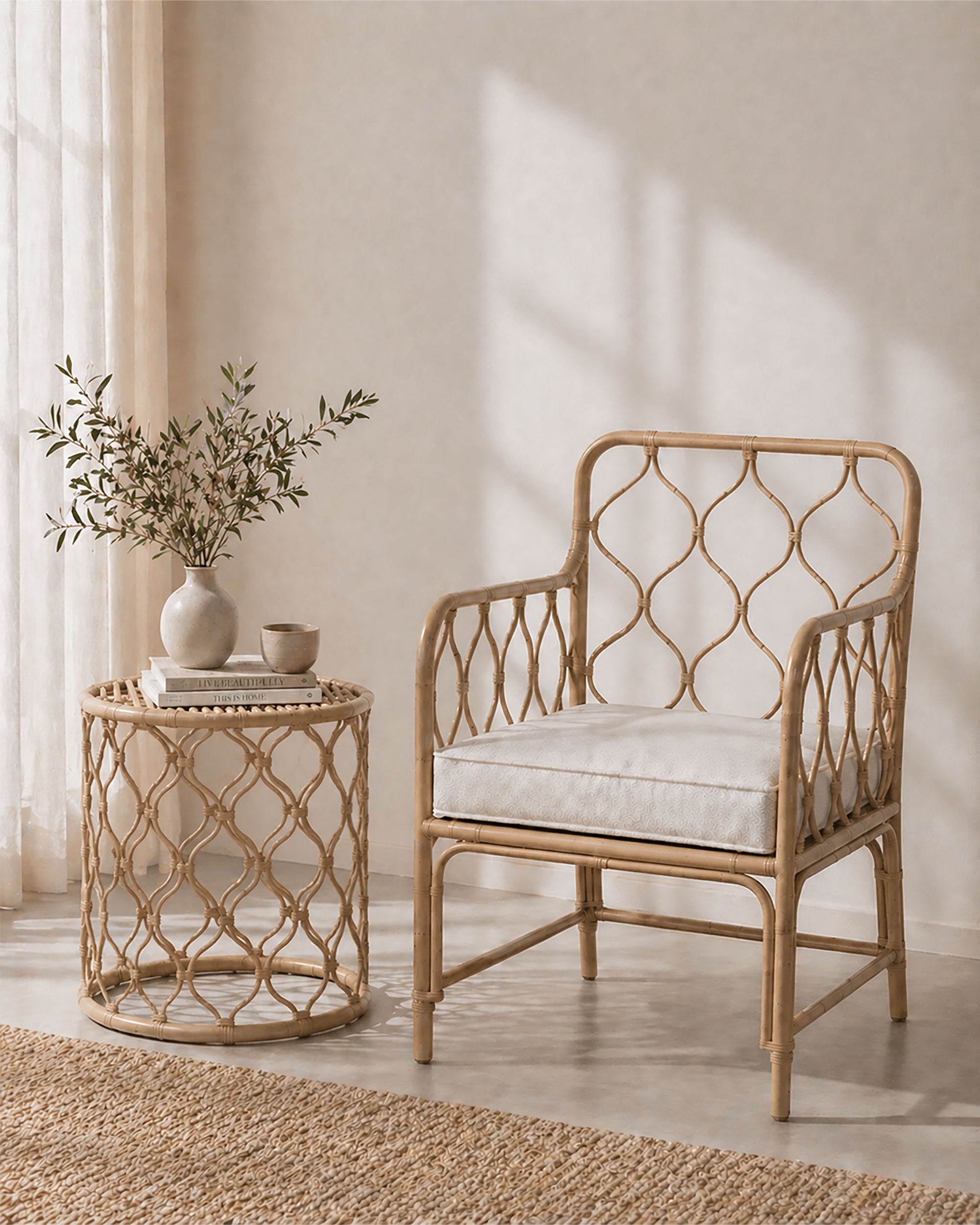 Aluminium armchair with a matching side table in a bright room