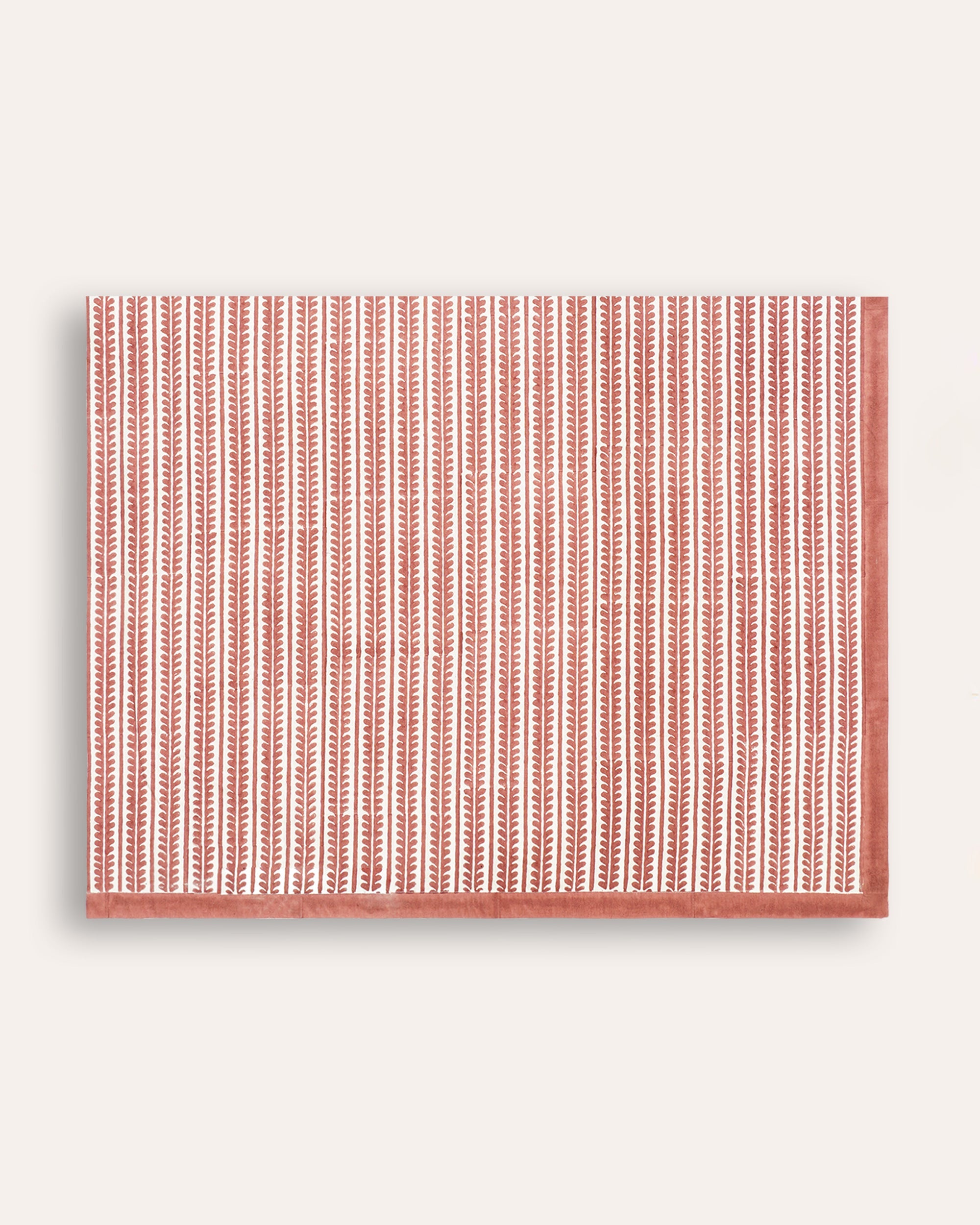 Red bel linen tablecloth, with a geometric botanical linear pattern