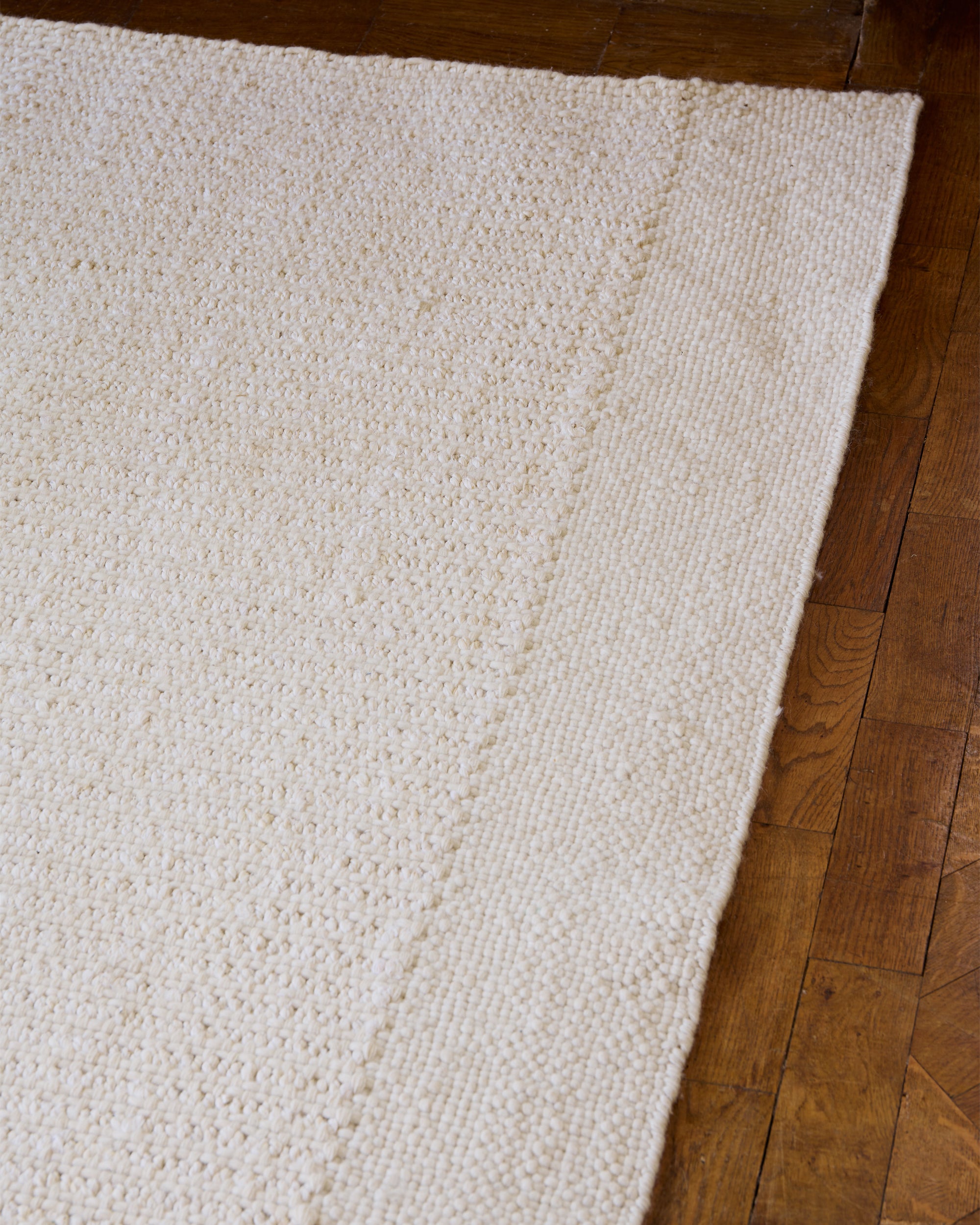 Off White Braided Rug