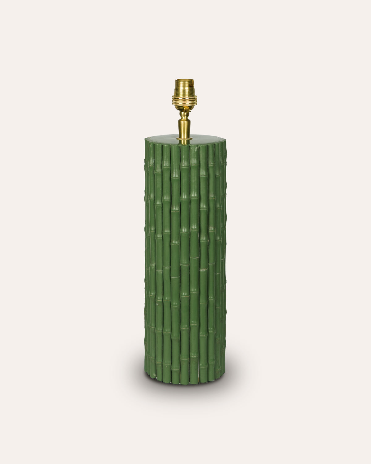Green bamboo-patterned lamp base on a white background