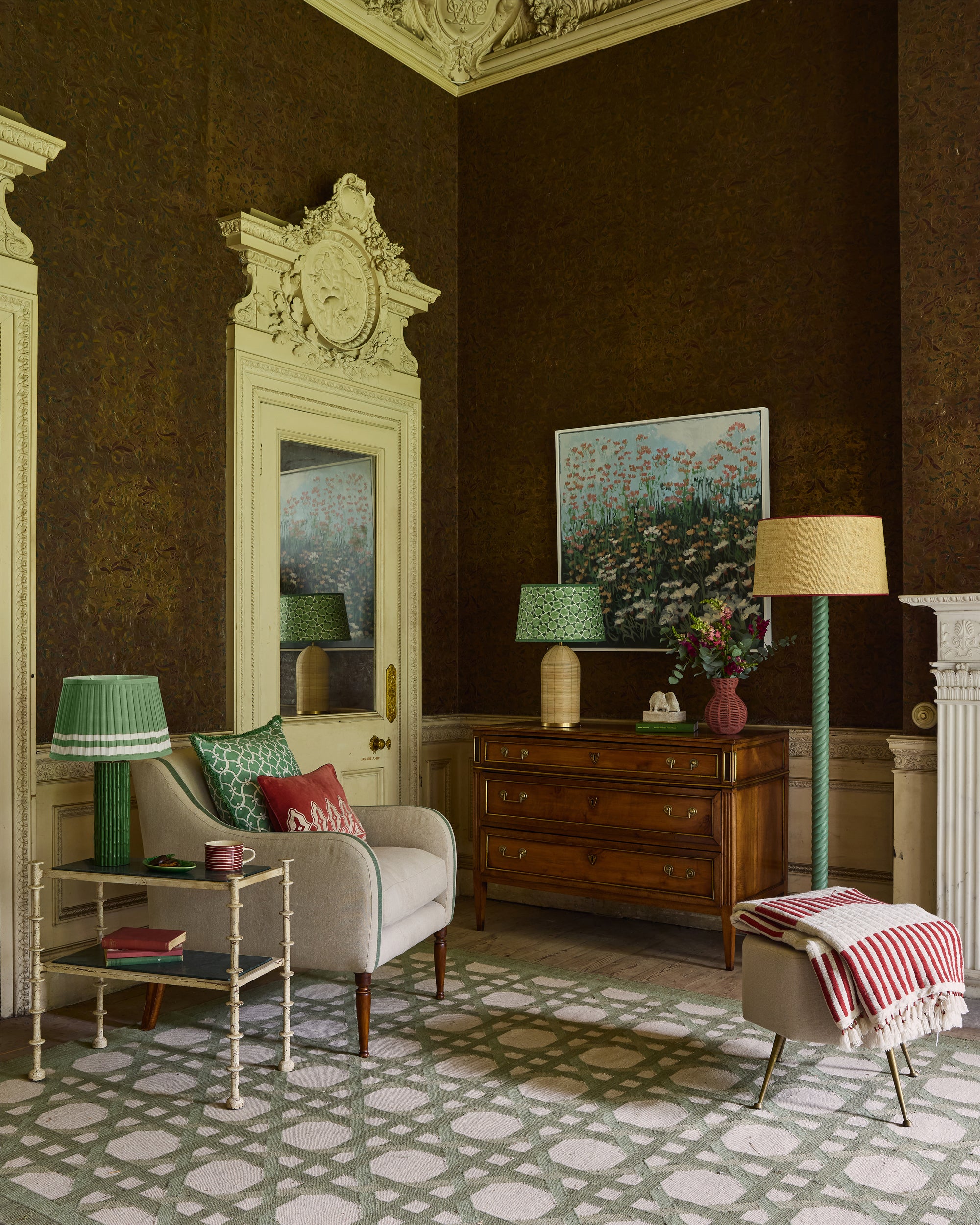 Luxurious living room with ornate decor, furniture, and artwork.