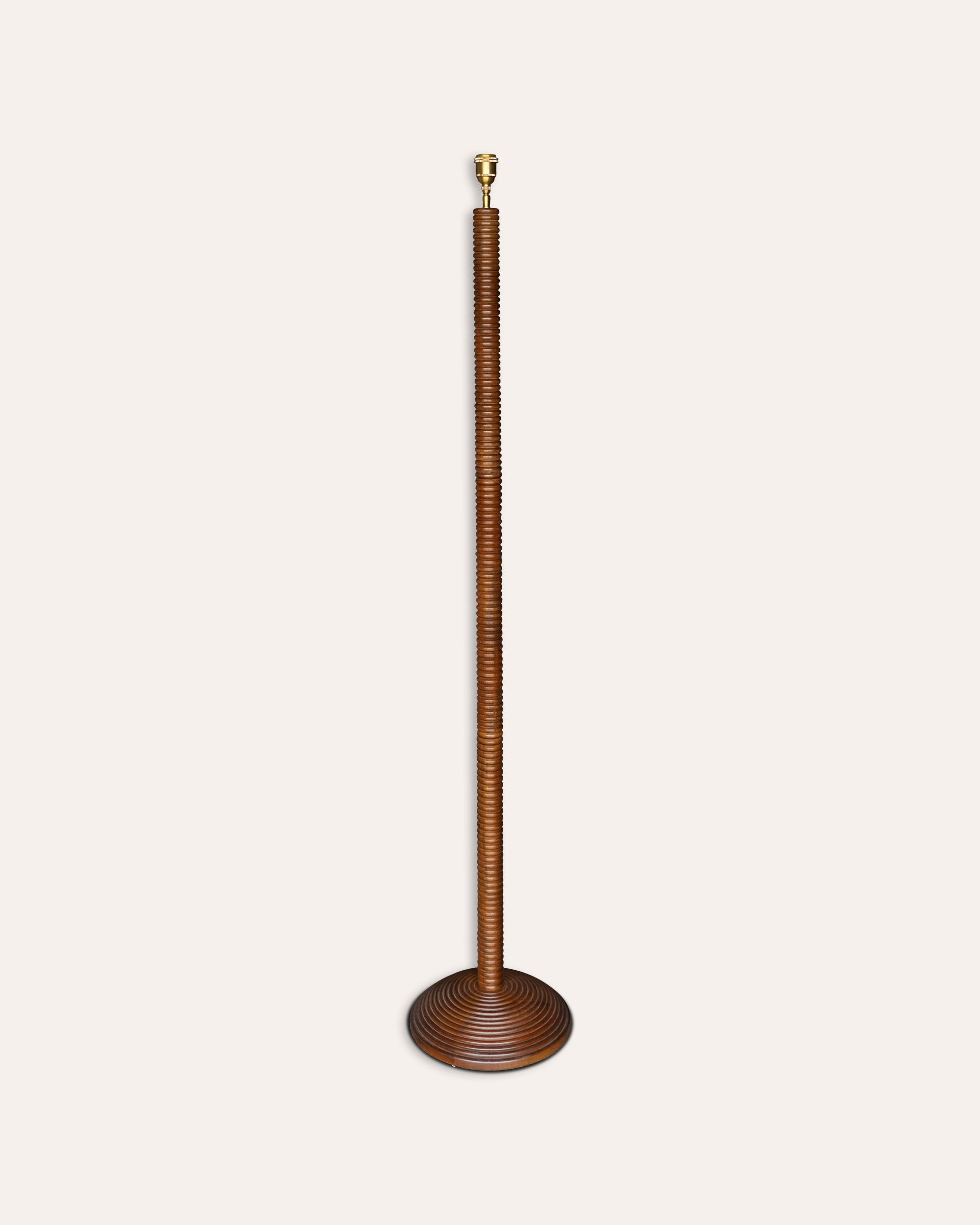 Tall Wooden carved floor lamp with a brass fitting