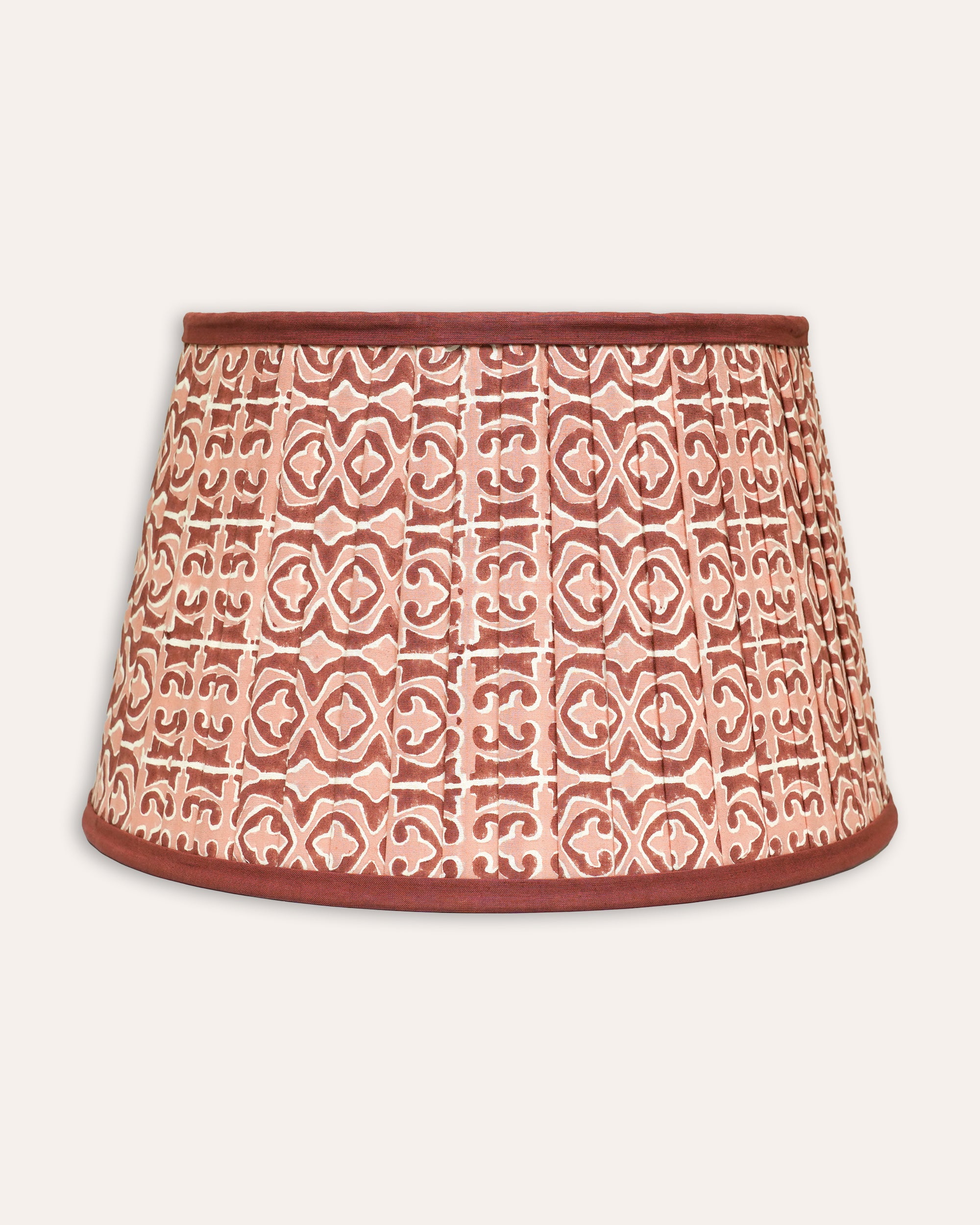 Pink and red Clara pleated block print lampshade with a geometric pattern - Birdie Fortescue lighting