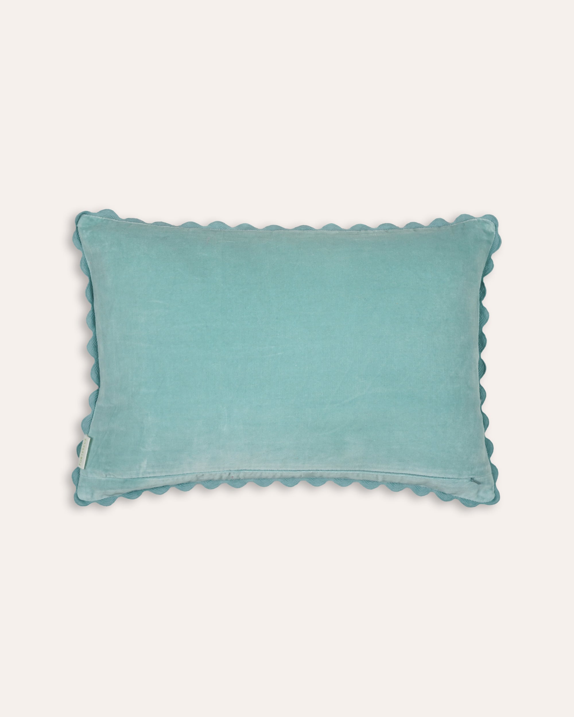 Light blue velvet cushion back with scalloped edge on a white background