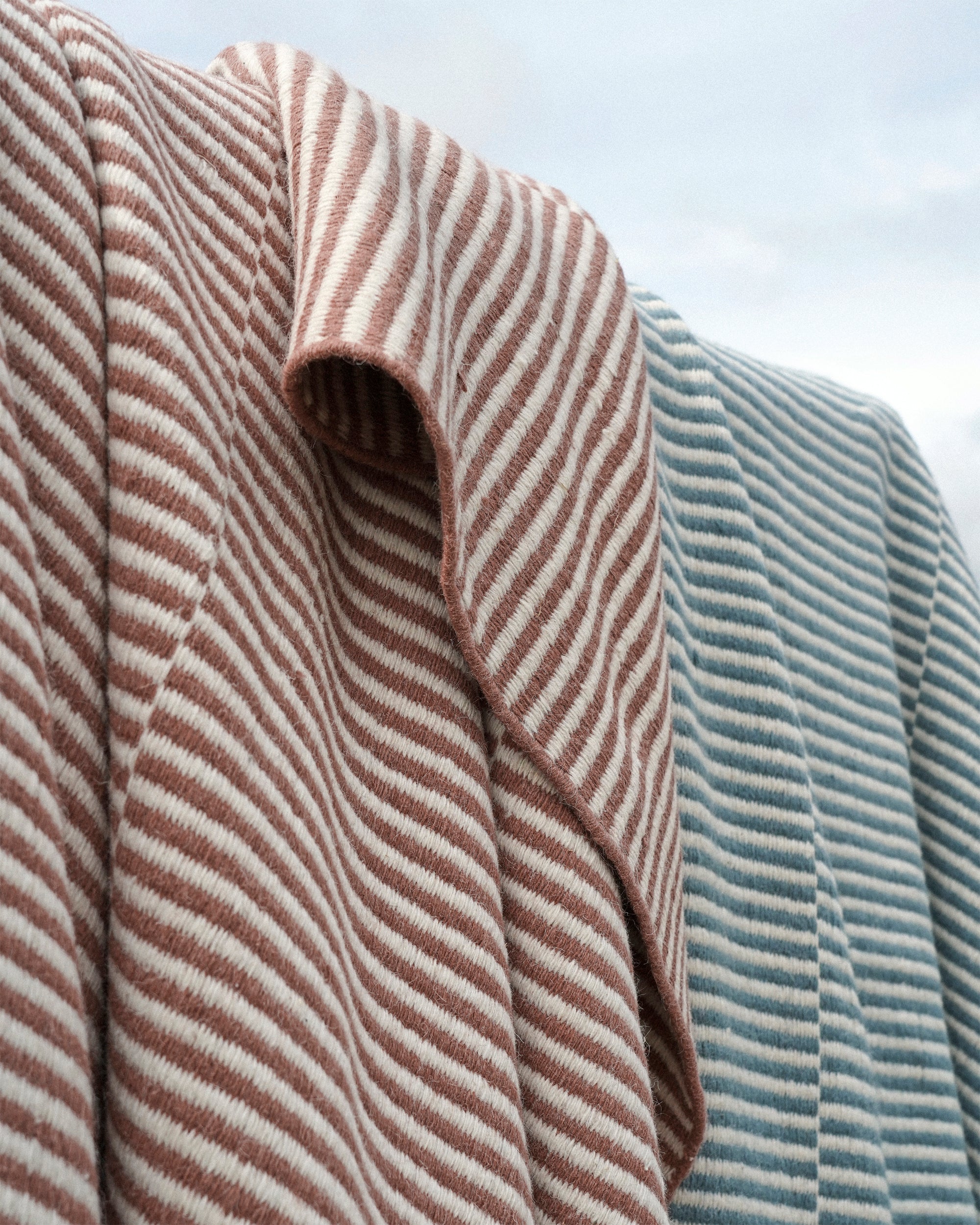 Close-up of striped fabric with a soft texture.