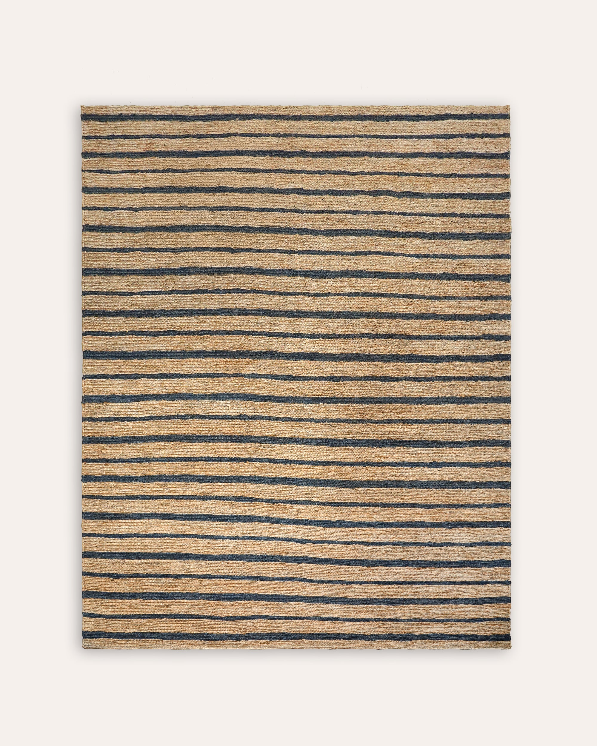 Striped rug with beige and navy horizontal lines on a white background