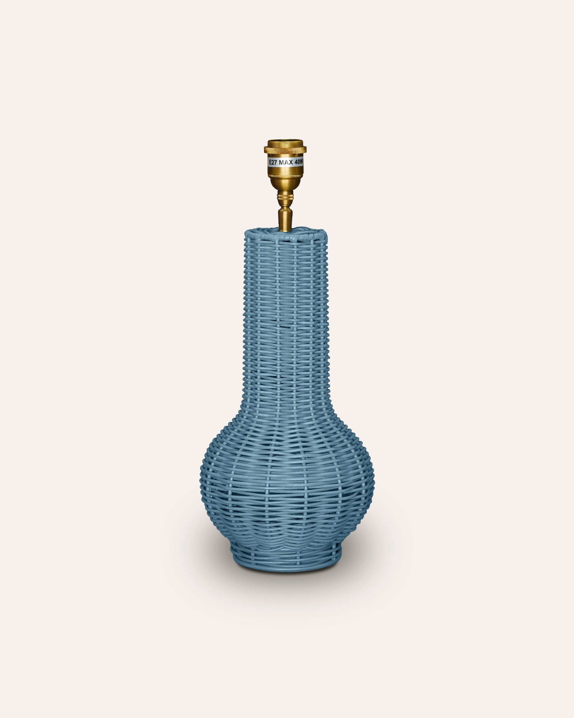 Blue textured Surahi Rattan Table lamp product image on a taupe background