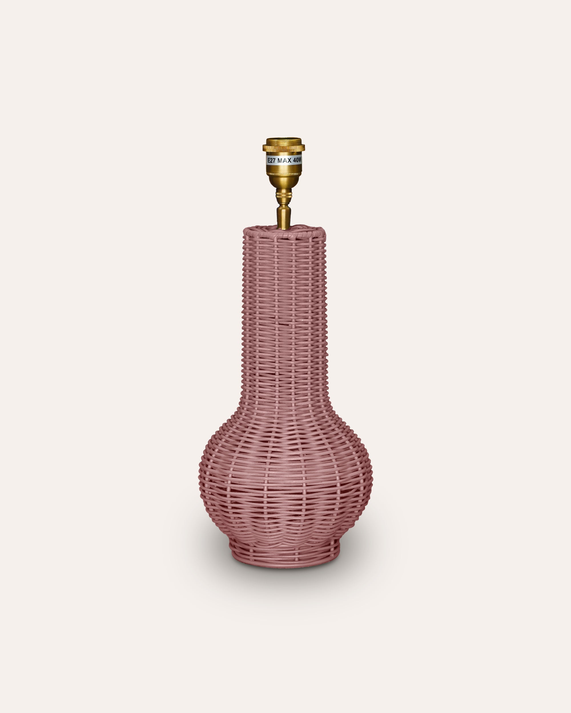 Pink textured Surahi Rattan Table lamp product image on a taupe background