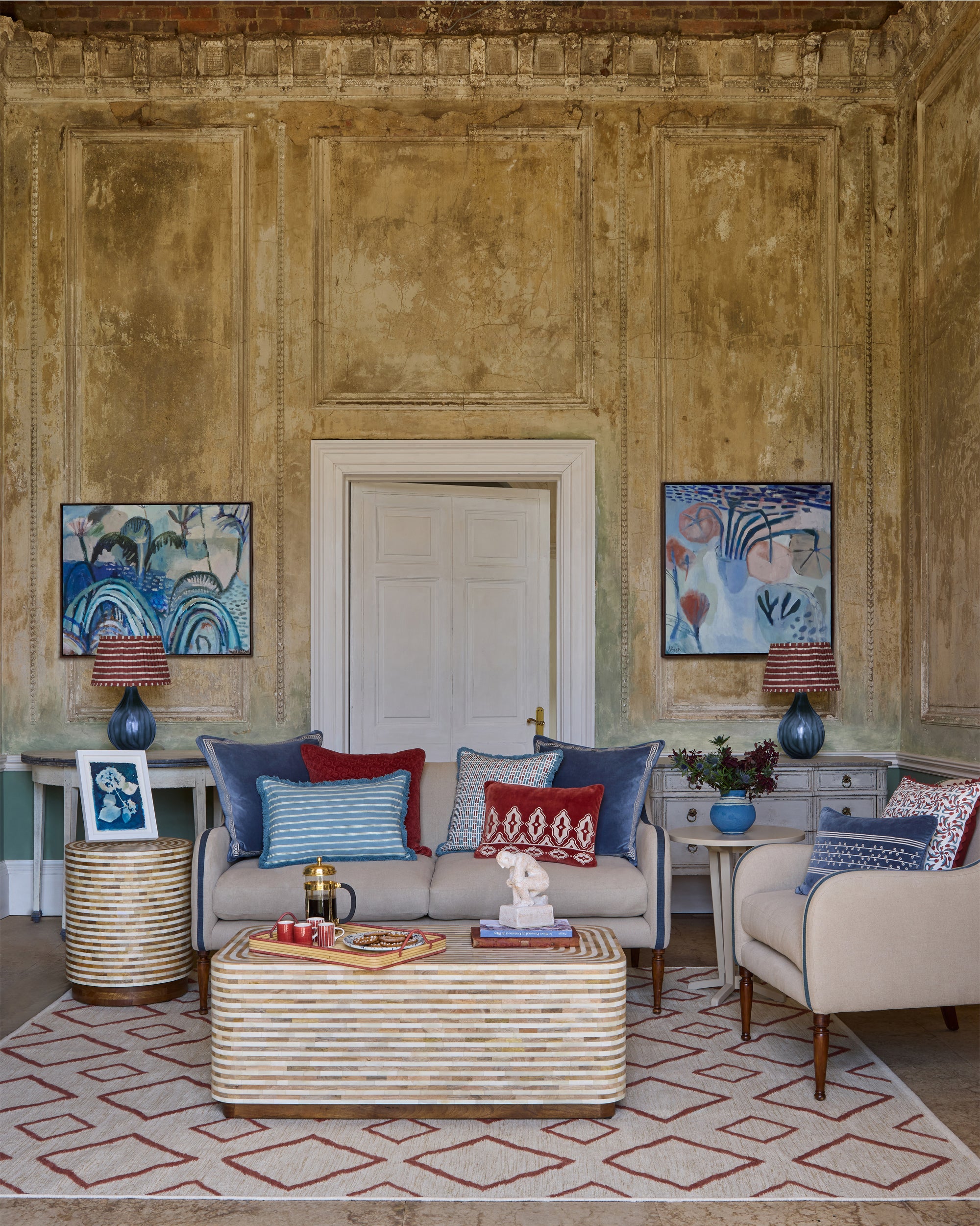 Ladrillo Tile Print Fringed Cushion - Blue & Green, in a grand sitting room