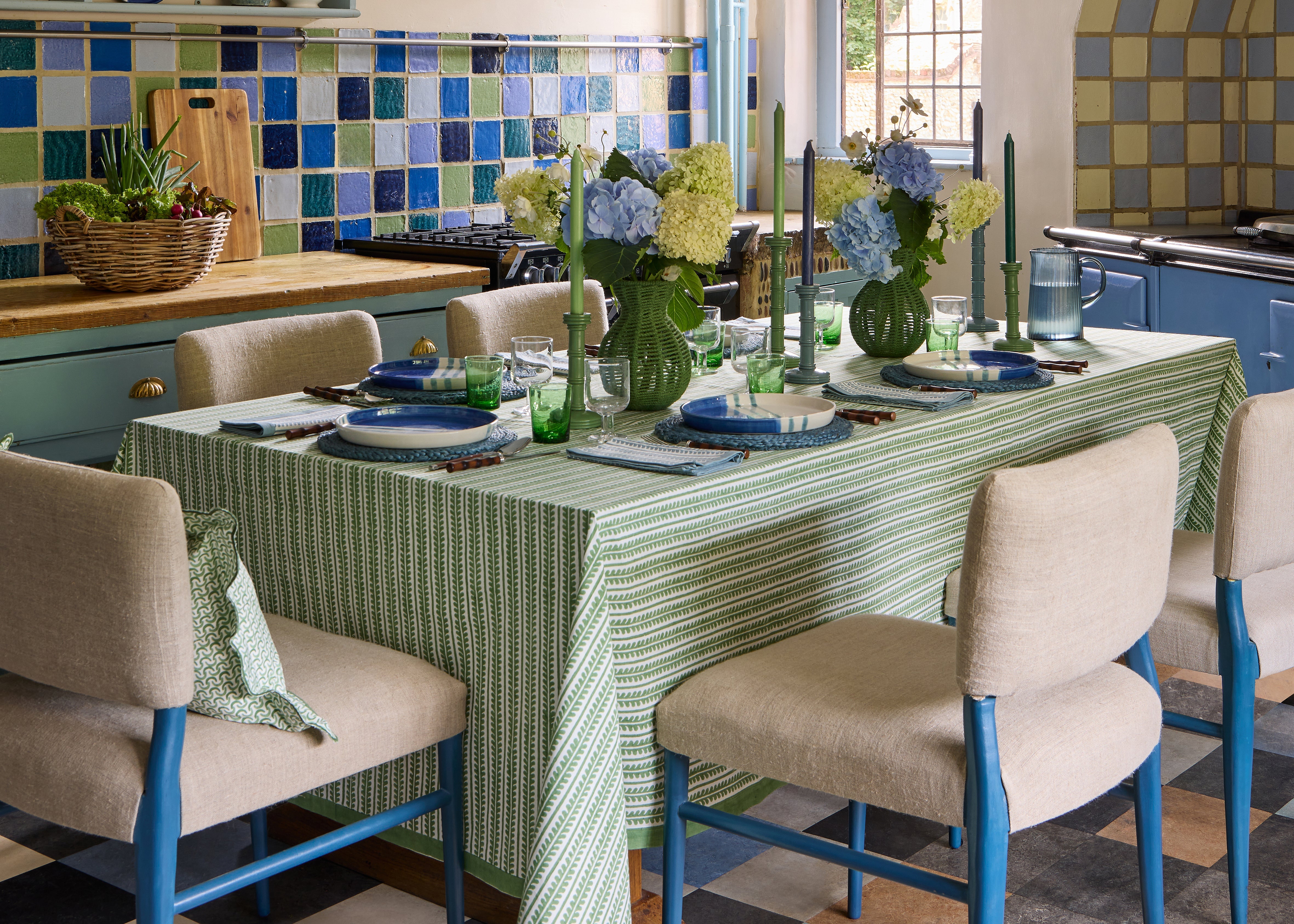 A blue table with blue bel napkins