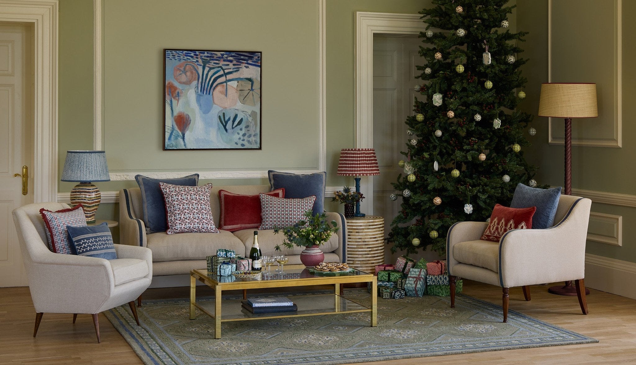 The varuna rug in a sitting room with a christmas tree and gold coffee table