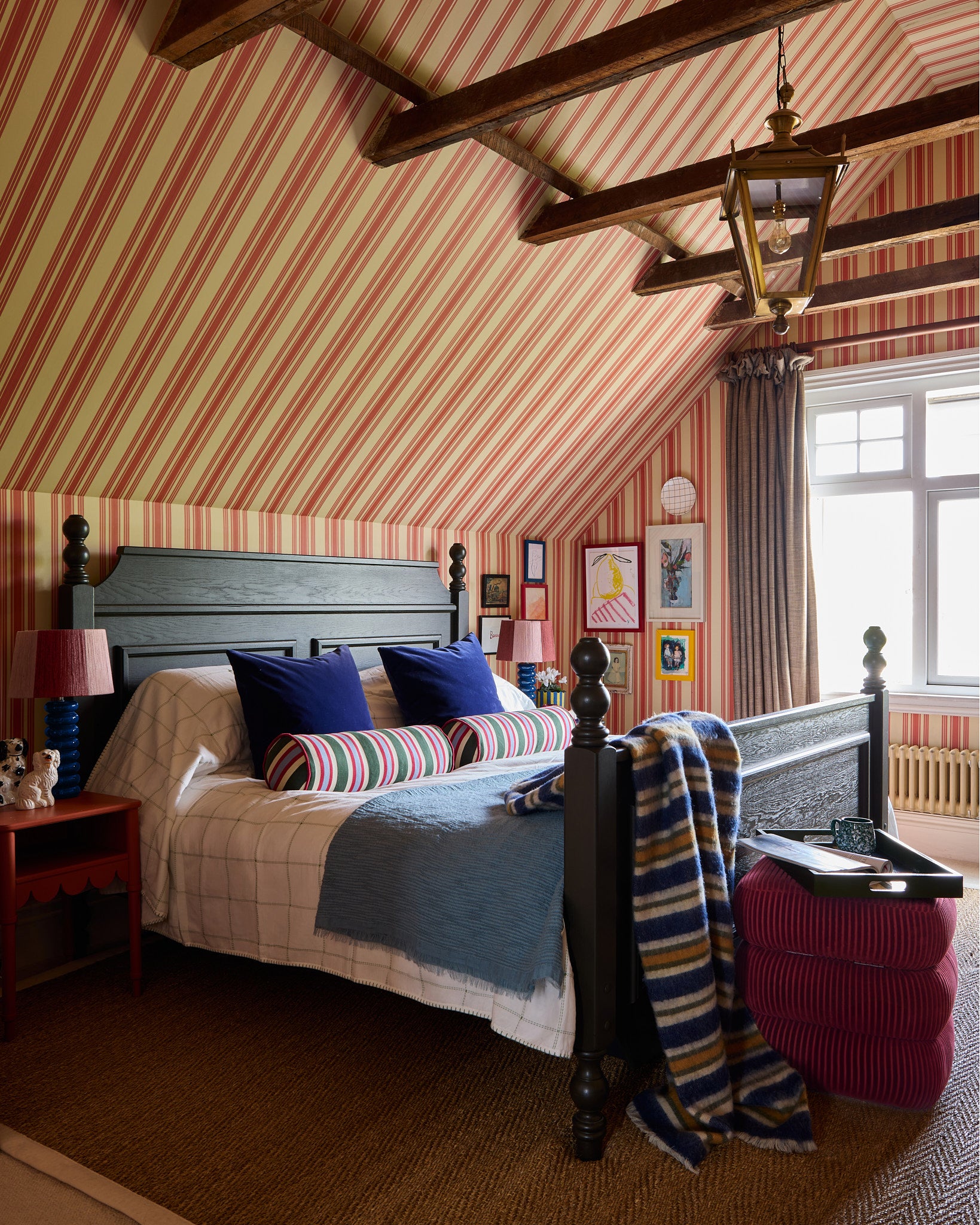 Sarah's bedroom styled with the stripes galore bolster cushion, striped throw and classic stool