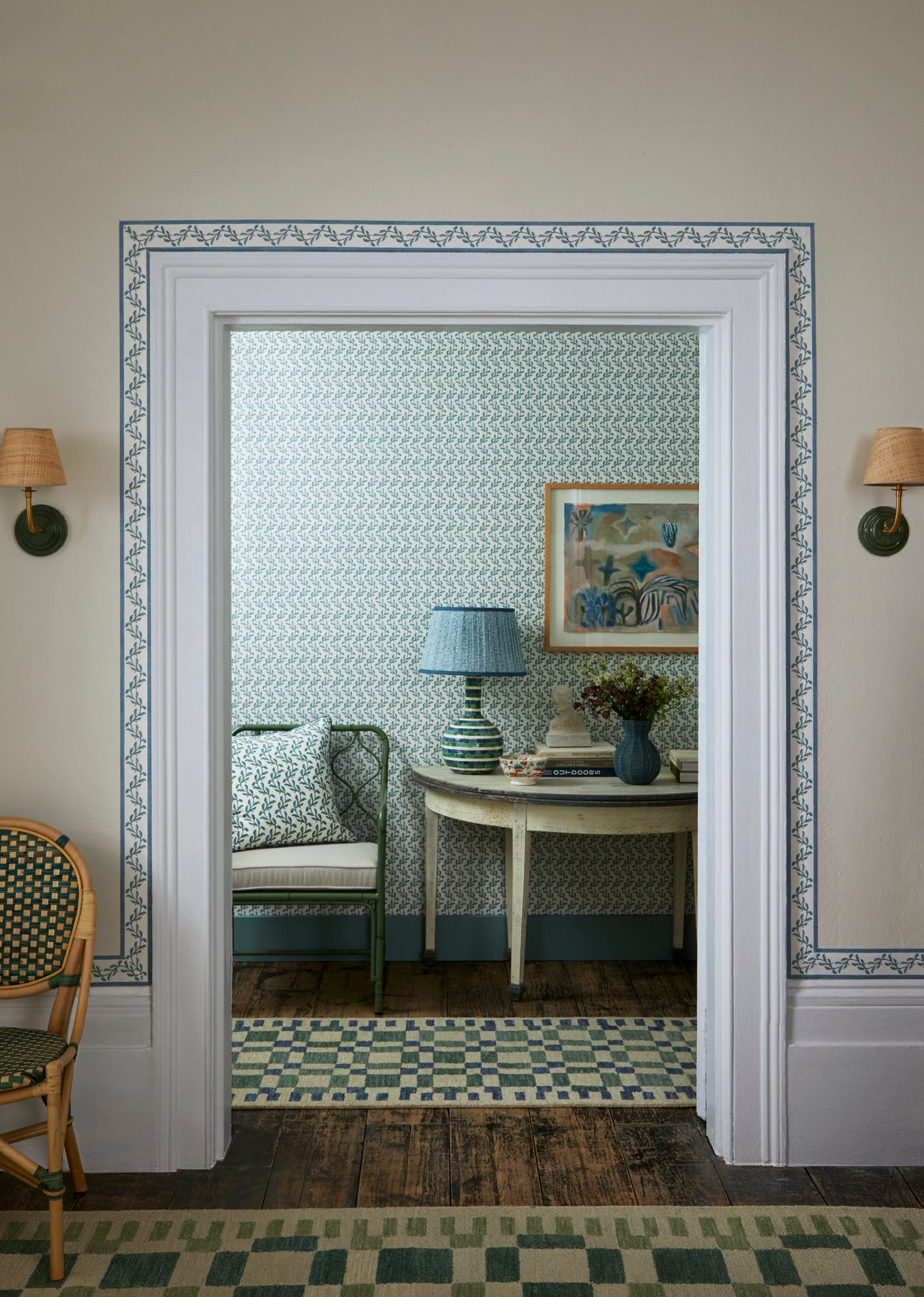 Lifestyle image featuring the Mariana Floral blue border and blue and green Mariana wallpaper