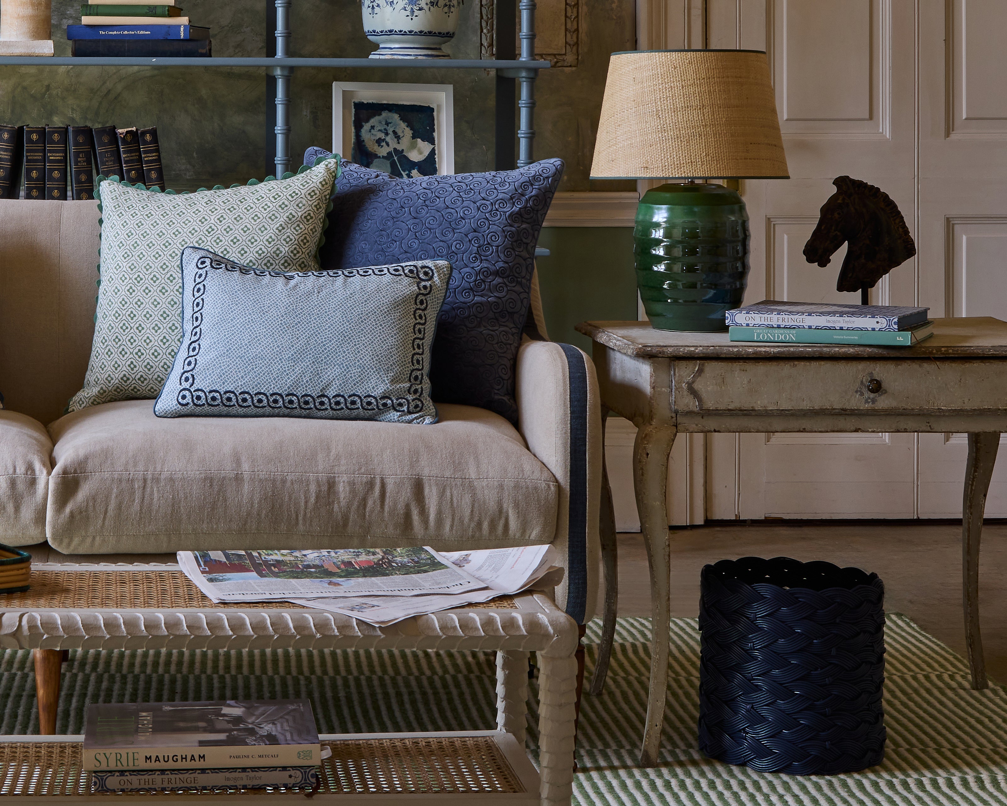 Blue and green themed sitting room, featuring our green Beehive lamp and Seema Raffia shade