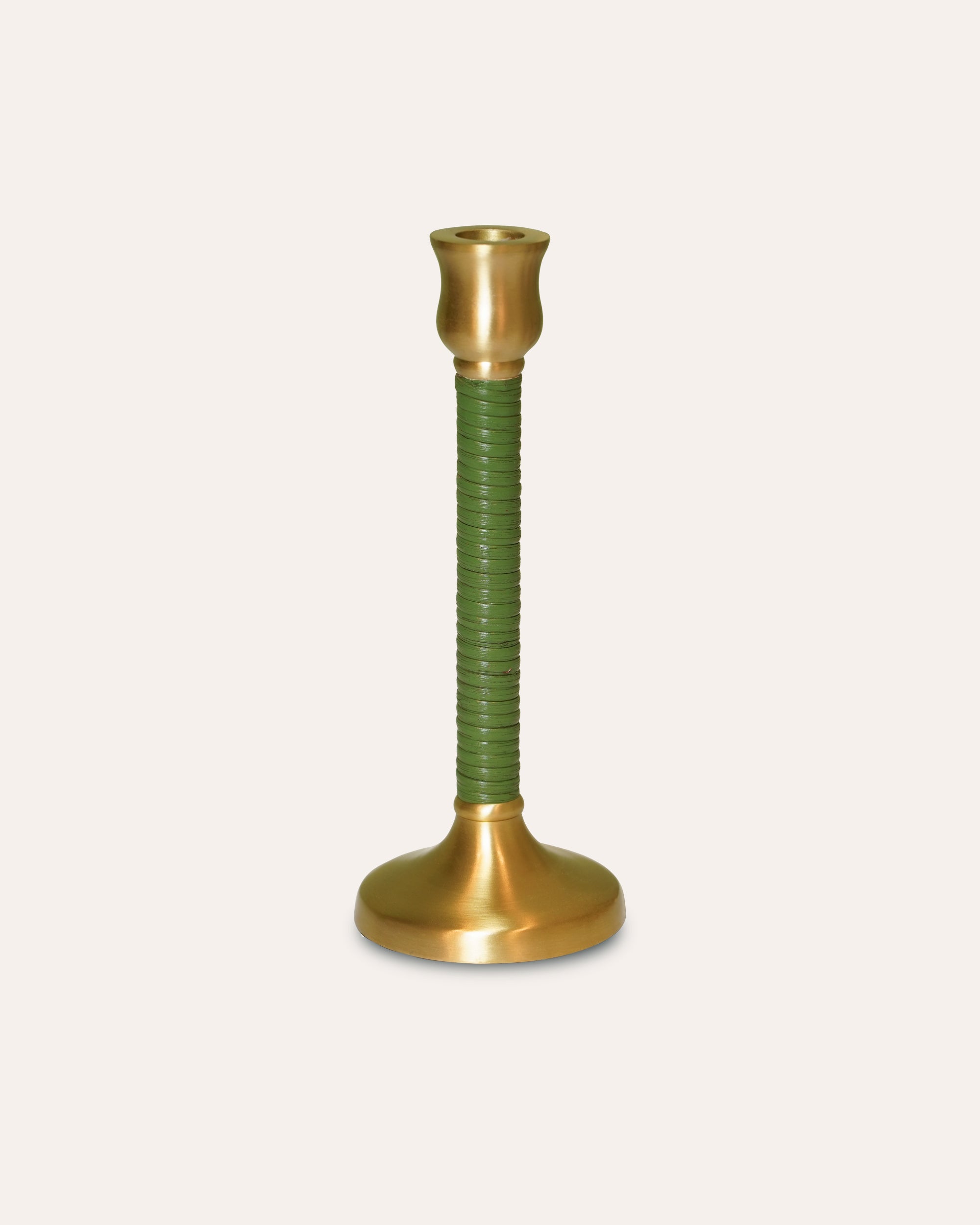 Decorative candle holder with green spiral design and gold base on a white background