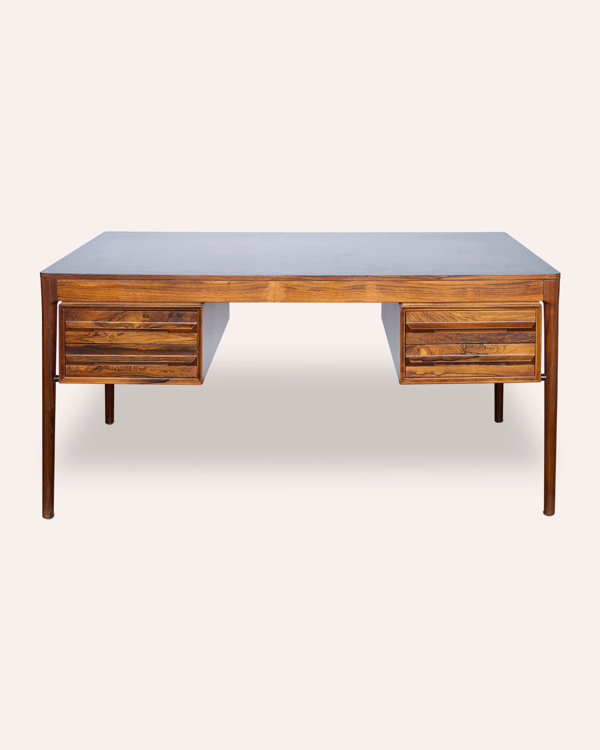 A generous Italian 1970's rosewood kneehole desk