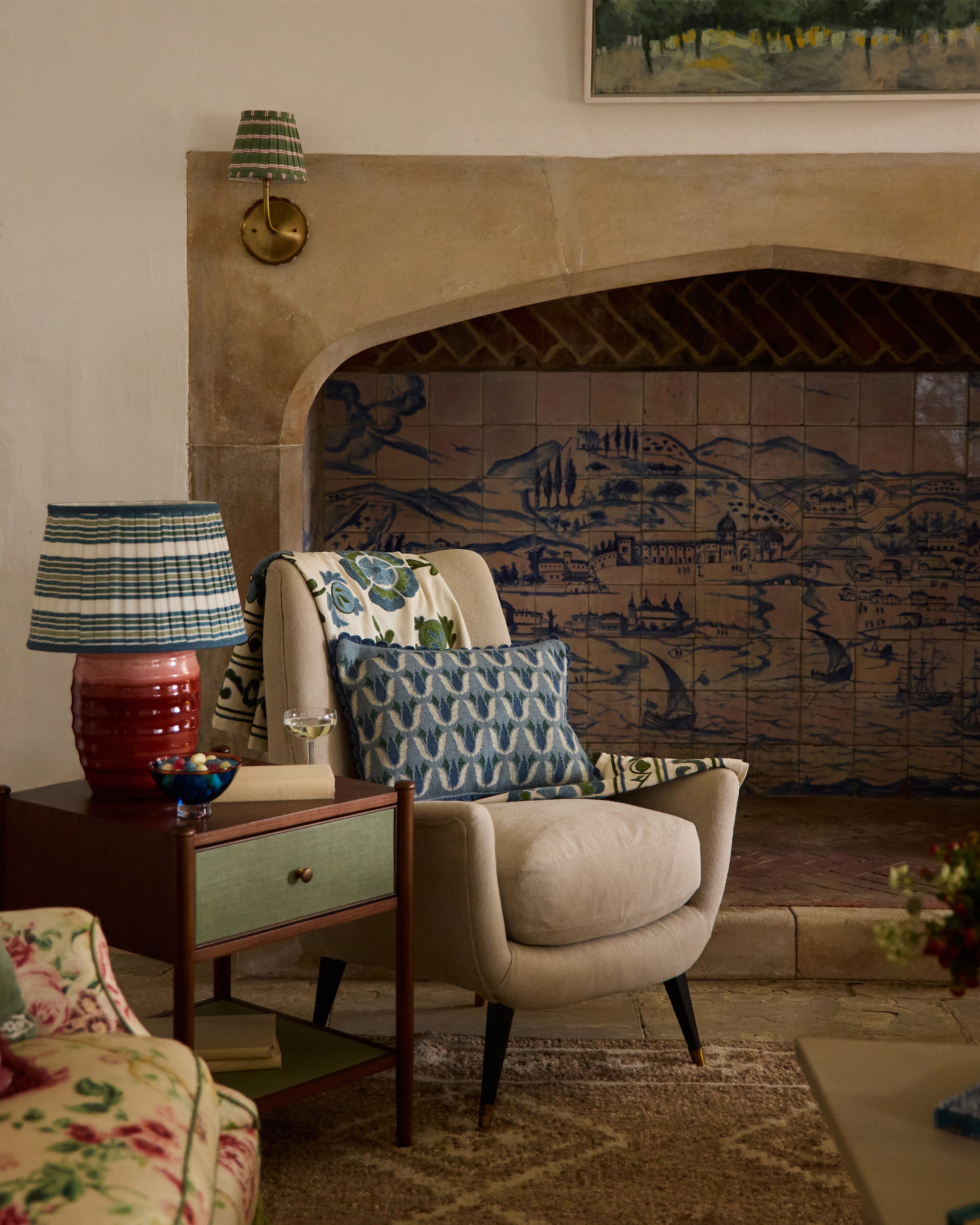 Living room with vintage furniture and decorative tiles on the wall