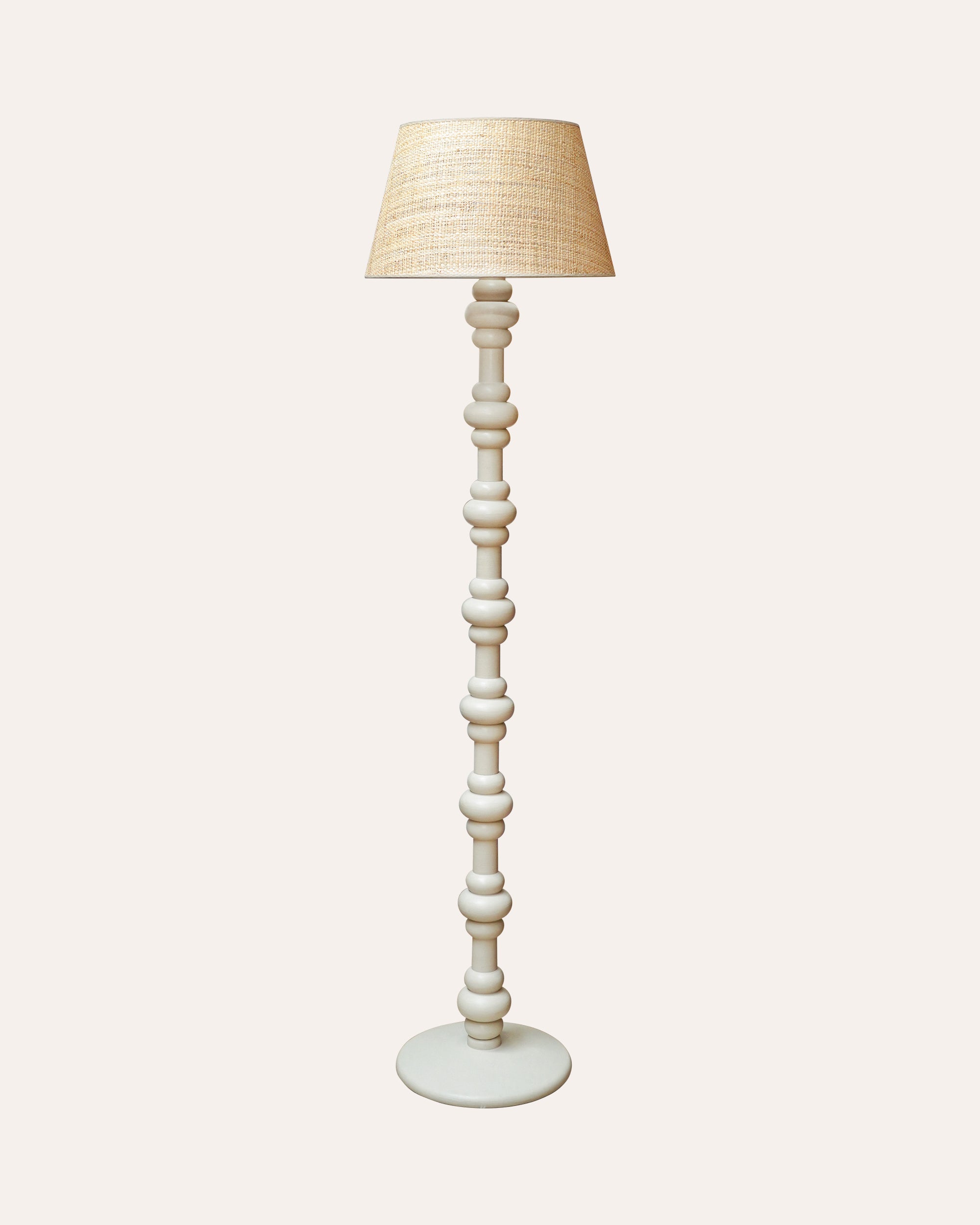 Birdie Fortescue Abacaus floor lamp with a natural Seema Raffia lampshade