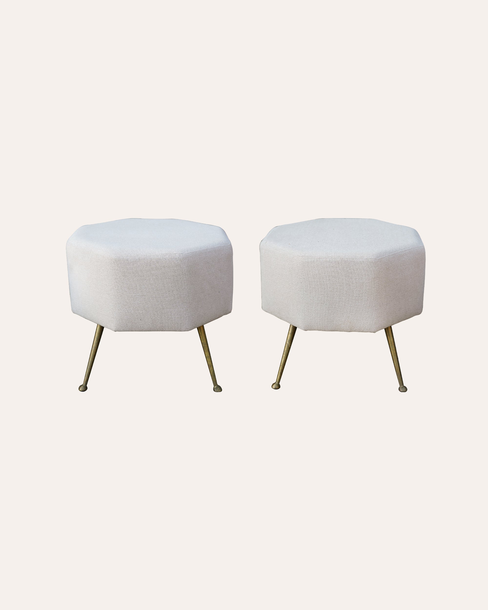 A Pair of Continental Mid Century Upholstered Hexagonal Stools with Brass Legs