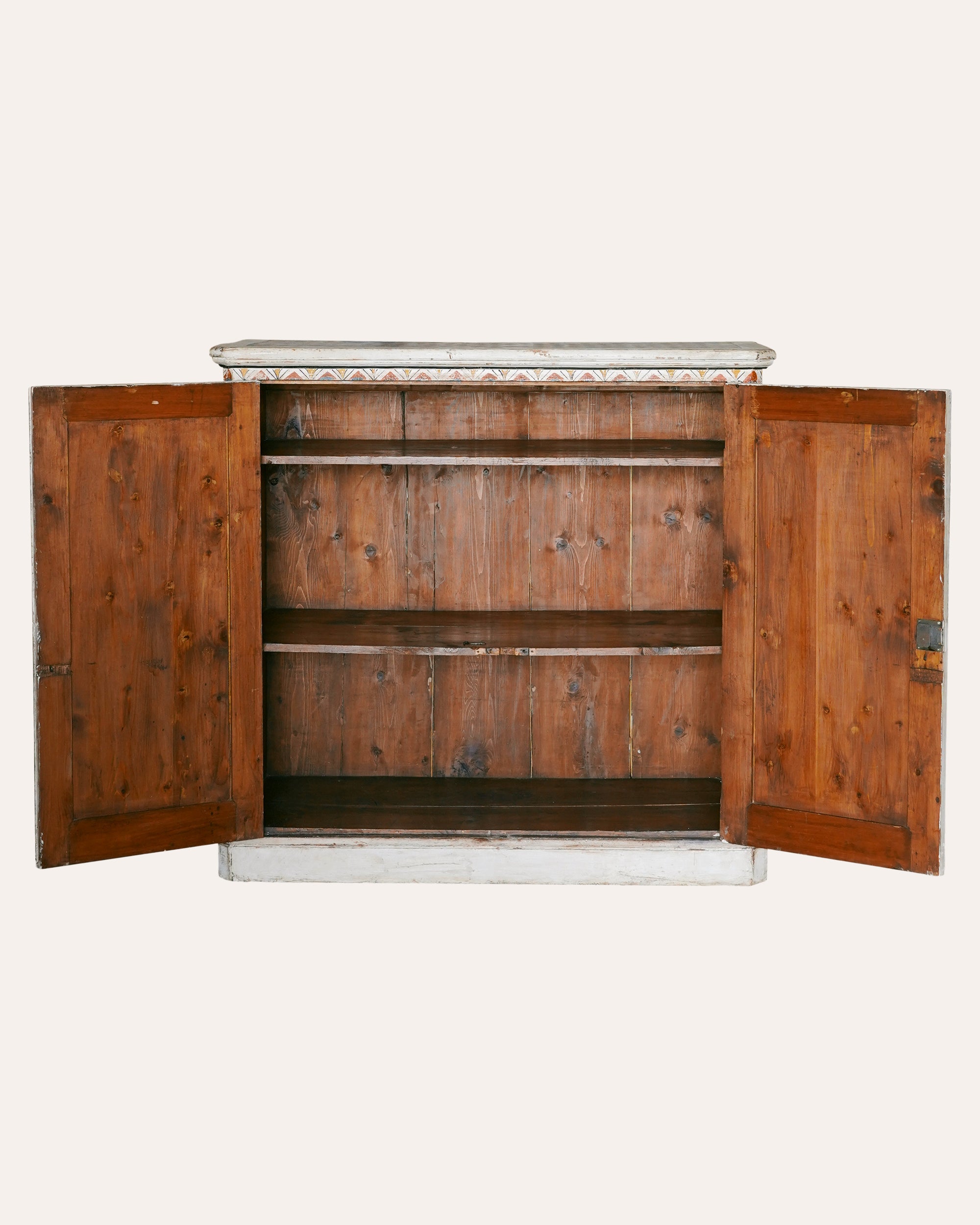 Wooden cabinet with open doors on a white background
