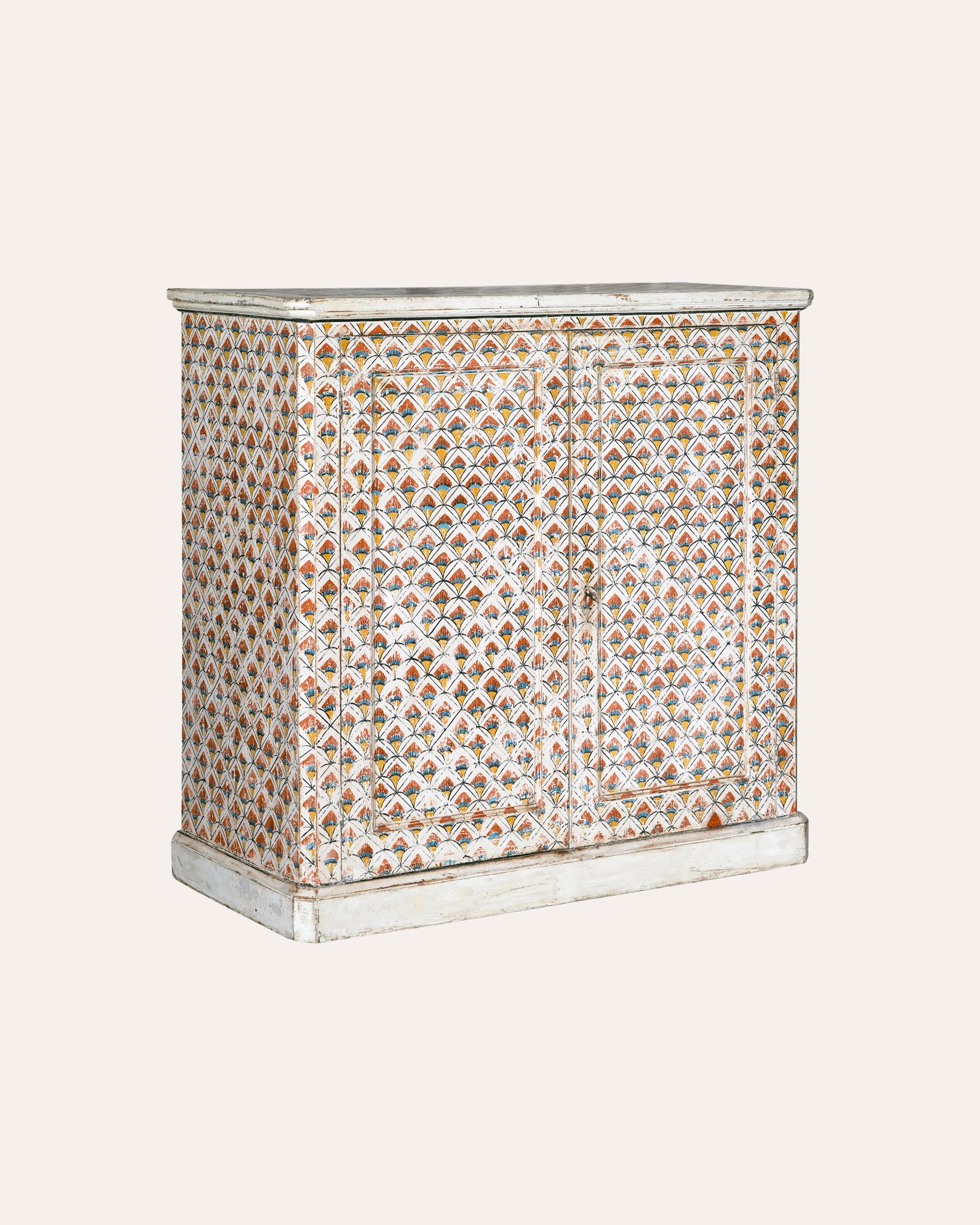 Decorative cabinet with a patterned design on a white background