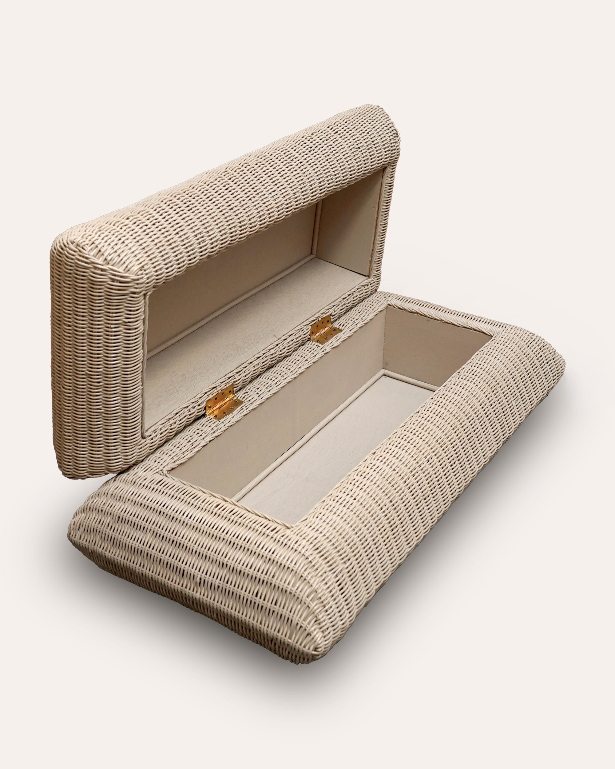 Woven beige rattan ottoman with an open storage