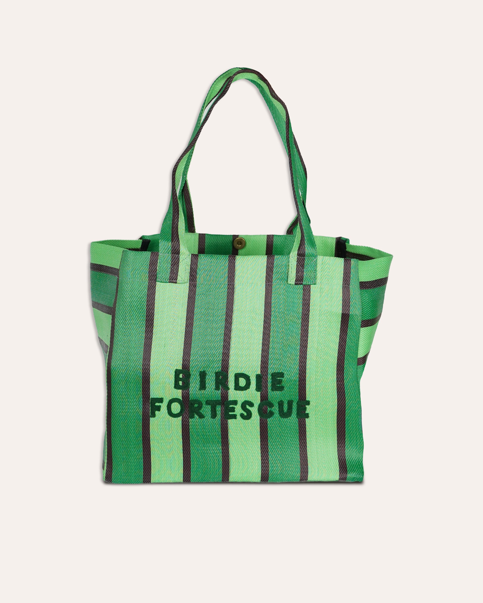 Green striped tote bag with 'Birdie Fortescue' branding on a white background