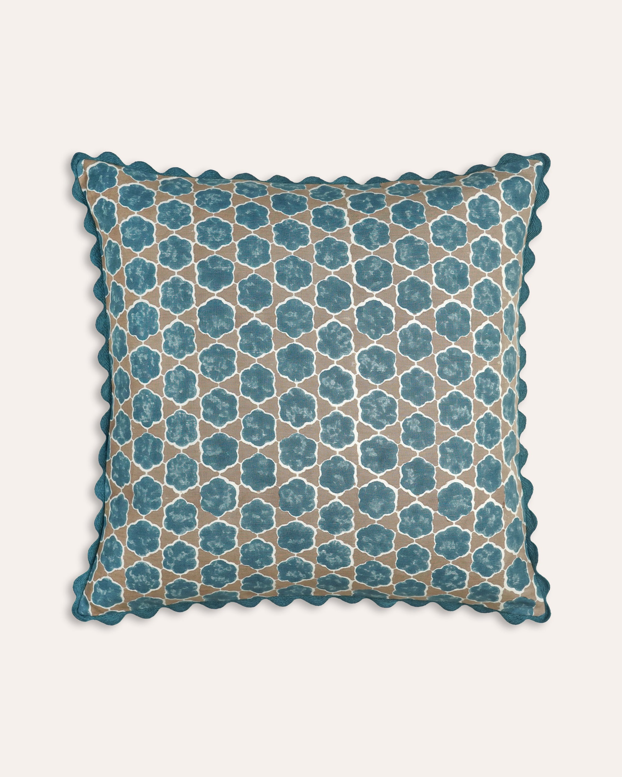 Decorative cushion with geometric pattern on a white background