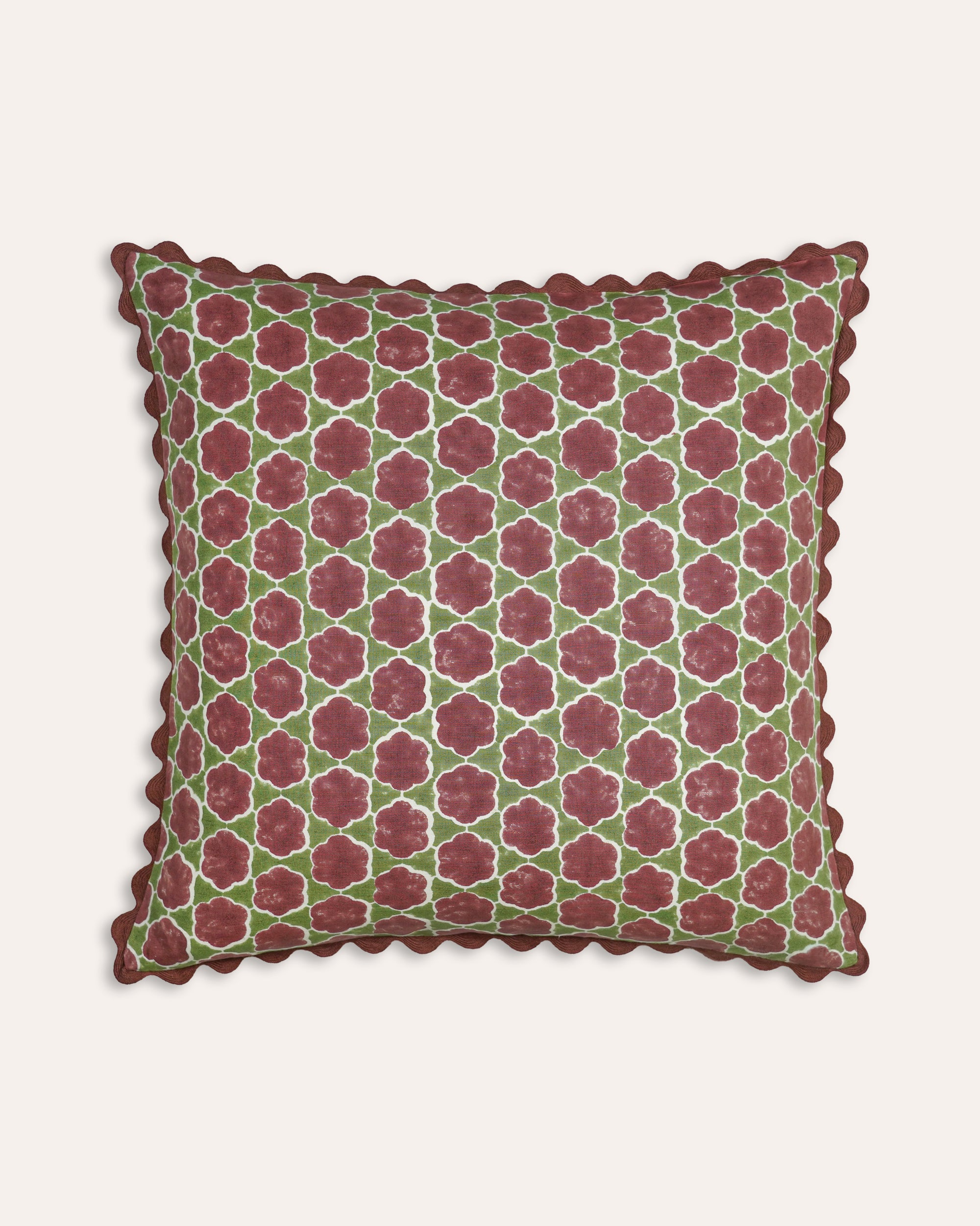Decorative cushion with geometric pattern on a white background