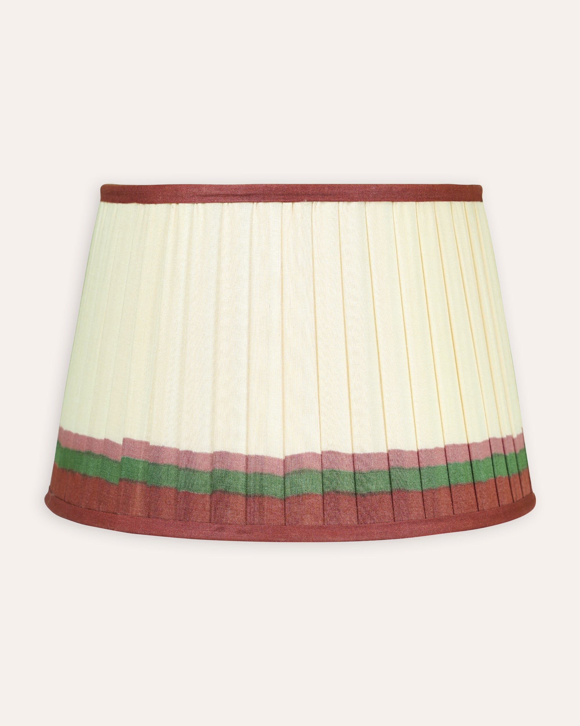Lampshade with pleated design and color-blocked waistband on a white background